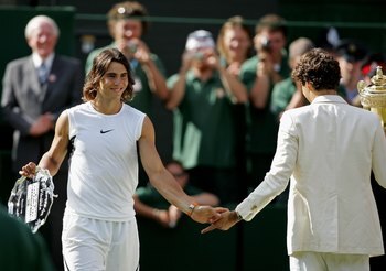 LONDON - JULY 09:  Roger Federer (R) of Switzerland and Rafael Nadal of Spain shake hands after the men's final on day thirteen of the Wimbledon Lawn Tennis Championships at the All England Lawn Tennis and Croquet Club on July 9, 2006 in London, England.