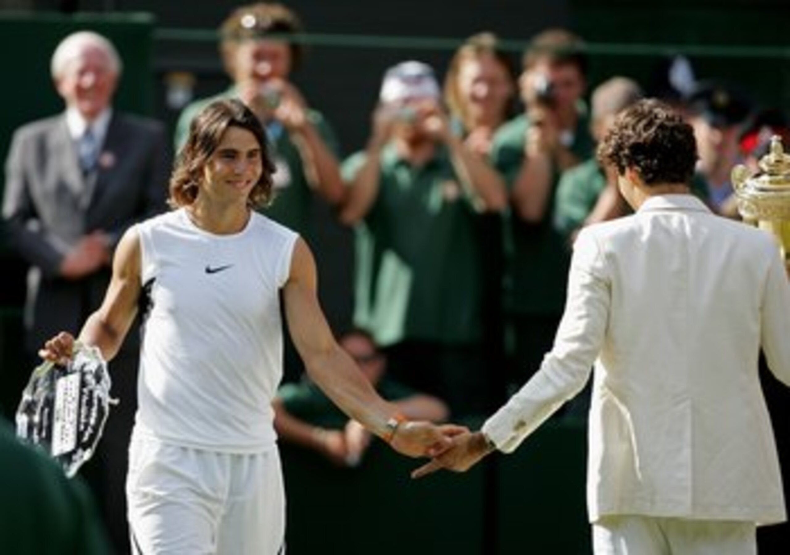 LONDON - JULY 09:  Roger Federer (R) of Switzerland and Rafael Nadal of Spain shake hands after the men's final on day thirteen of the Wimbledon Lawn Tennis Championships at the All England Lawn Tennis and Croquet Club on July 9, 2006 in London, England.