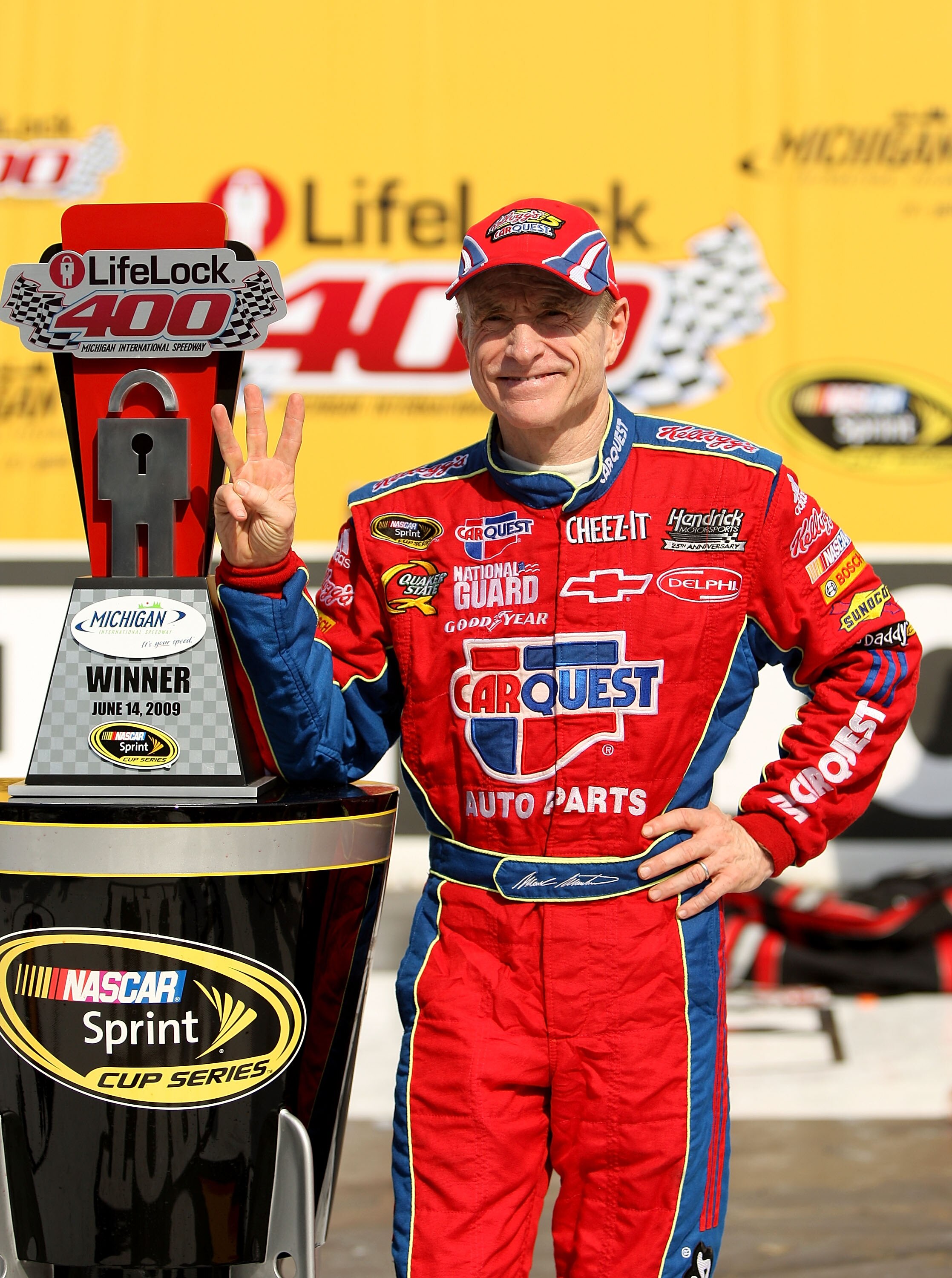 BROOKLYN, MI - JUNE 14:  Mark Martin, driver of the #5 CARQUEST/Kellogg's Chevrolet, celebrates in victory lane after winning the NASCAR Sprint Cup Series LifeLock 400 at Michigan International Speedway on June 14, 2009 in Brooklyn, Michigan.  (Photo by E