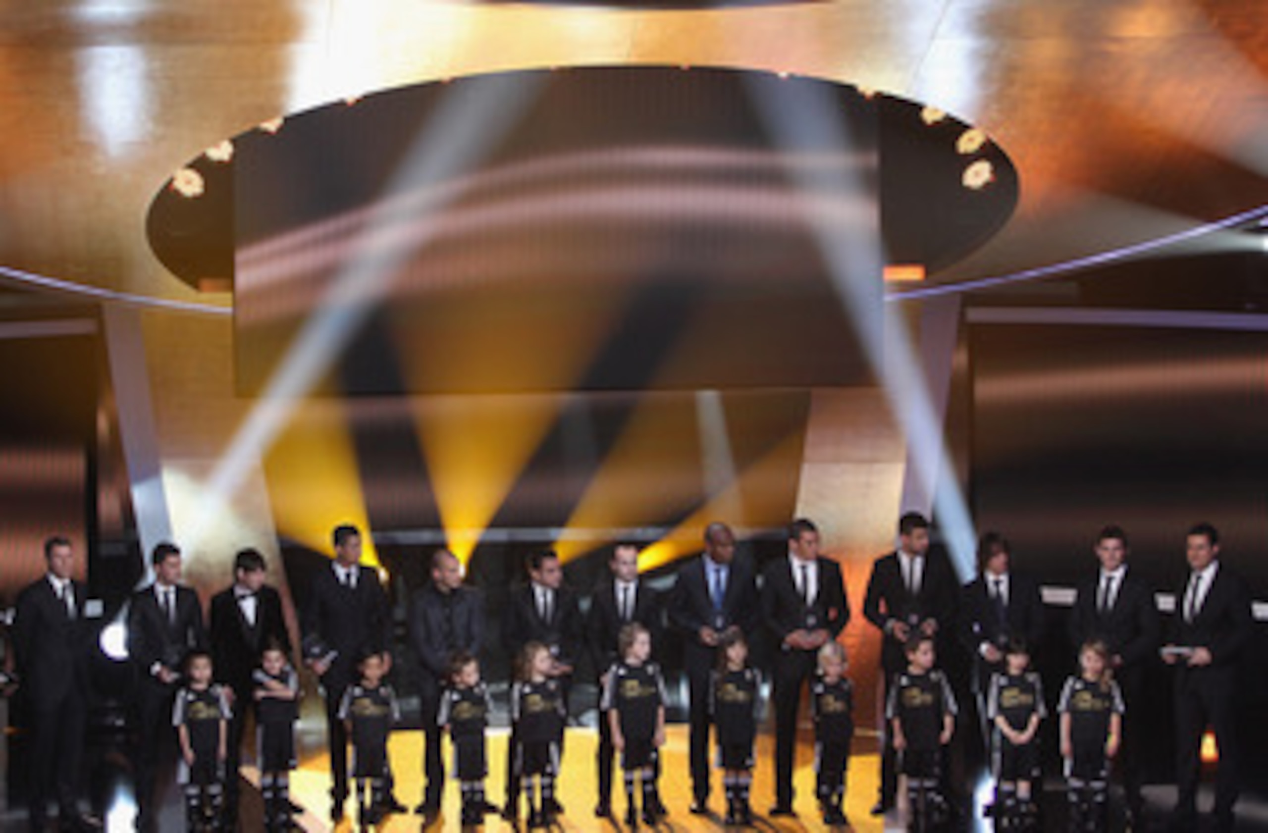 ZURICH, SWITZERLAND - JANUARY 10:  Fifa World XI award including Cristiano Ronaldo,Maicon,Lucio,Gerard Pique,Iker Casillas, front row l to r: David Villa,Lionel Messi,Wesley Sneijder,Xavi,Andres Iniesta,Puyol during the FIFA Ballon d'or Gala at the Zurich