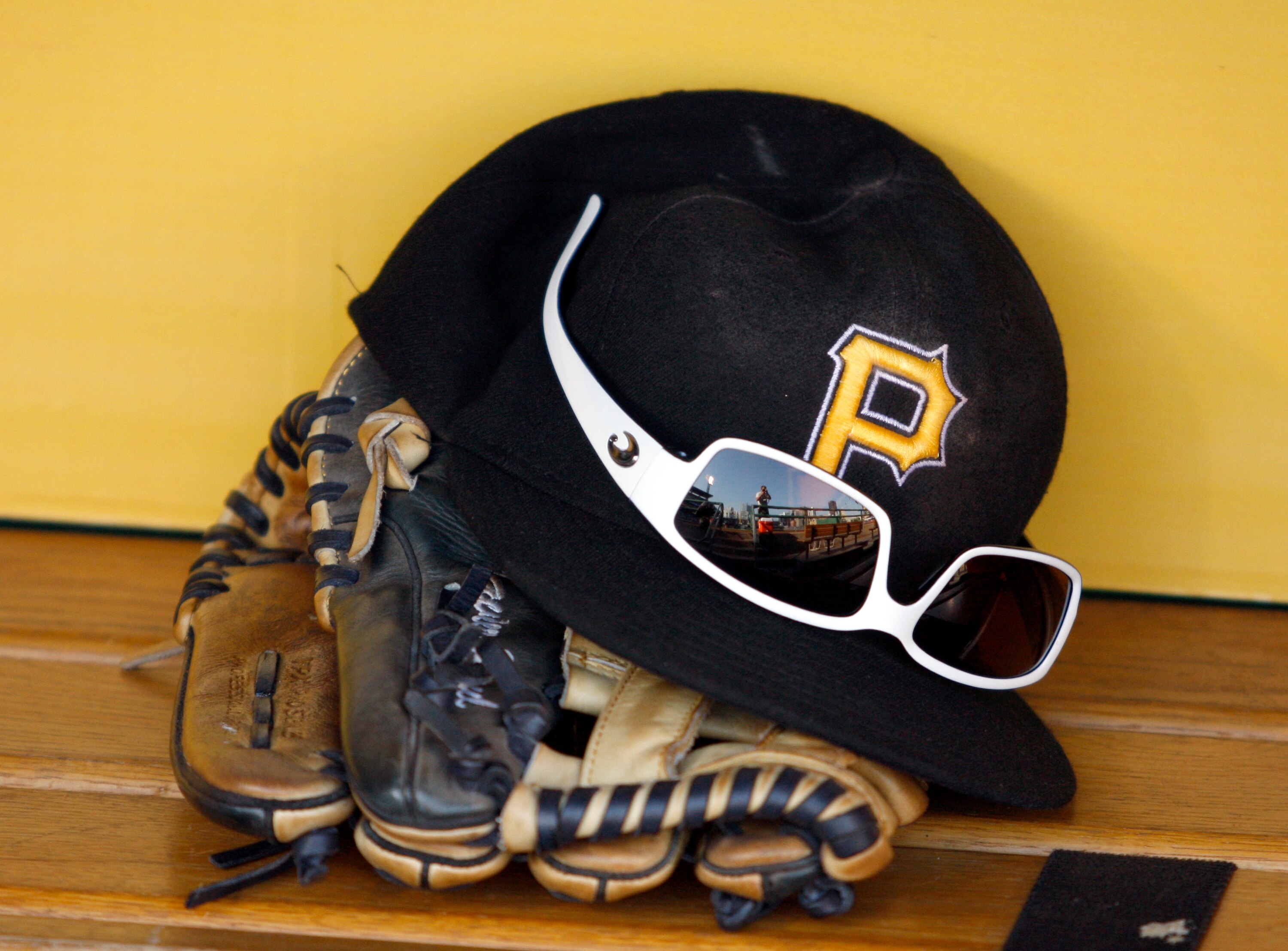 PITTSBURGH, PA - JUNE 11:  A detailed view of a Pittsburgh Pirates hat and glove before the game against the New York Mets on June 11, 2011 at PNC Park in Pittsburgh, Pennsylvania.  (Photo by Justin K. Aller/Getty Images)