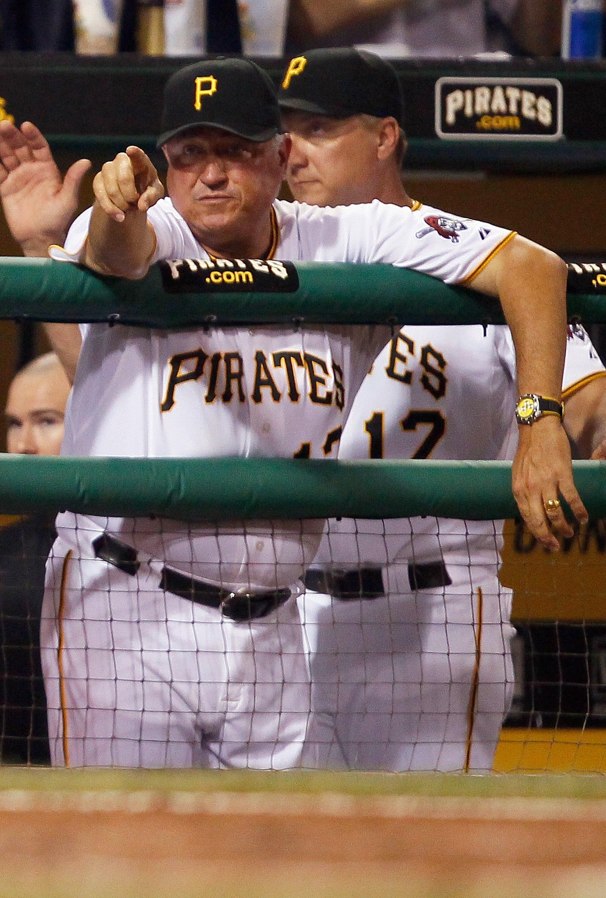 PITTSBURGH - JUNE 08:  Manager Clint Hurdle #13 of the Pittsburgh Pirates points to his players in the tenth inning against the Arizona Diamondbacks during the game on June 8, 2011 at PNC Park in Pittsburgh, Pennsylvania.  (Photo by Jared Wickerham/Getty