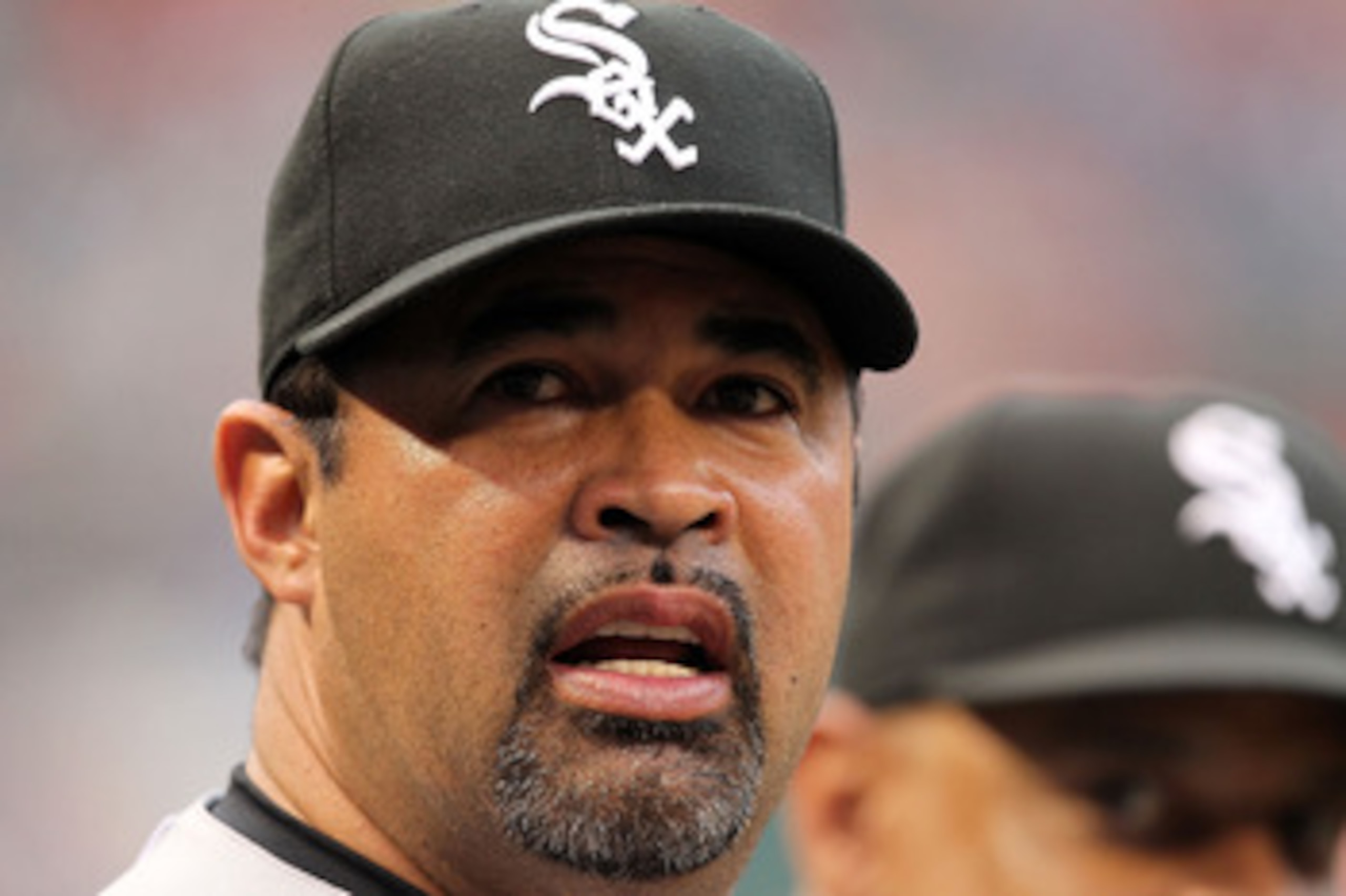 ARLINGTON, TX - MAY 24: Manager Ozzie Guillen #13 of the Chicago White Sox at Rangers Ballpark in Arlington on May 24, 2011 in Arlington, Texas. (Photo by Ronald Martinez/Getty Images) ARLINGTON, TX - MAY 24: Manager Ozzie Guillen #13 of the Chicago White Sox at Rangers Ballpark in Arlington on May 24, 2011 in Arlington, Texas. (Photo by Ronald Martinez/Getty Images)