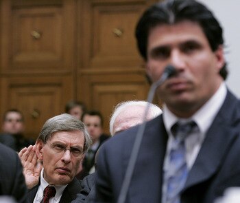 WASHINGTON - MARCH 17:  Major League Baseball Commissioner Allan 'Bud' Selig (L) cups his ear to listen to the testimony of former Major League Baseball player Jose Canseco during a House Committe session investigating Major League Baseball's effort to er