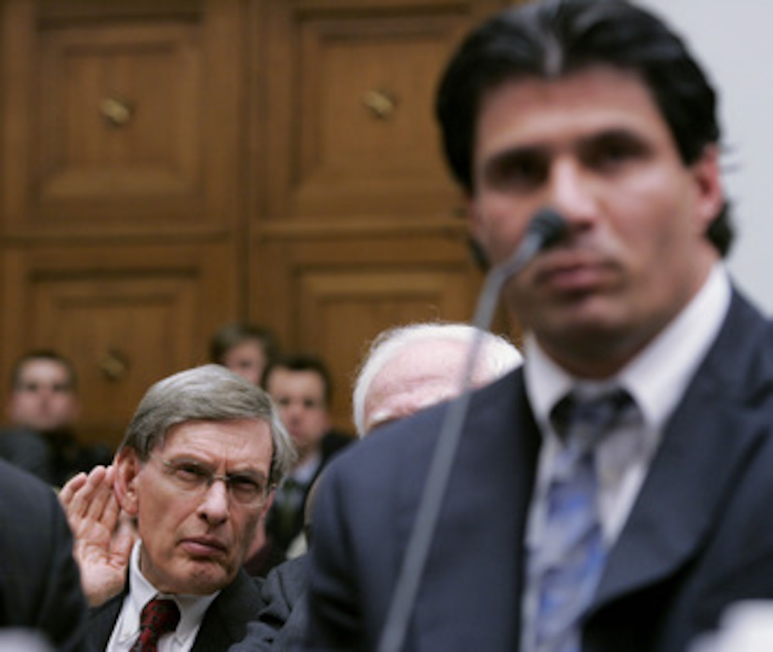 WASHINGTON - MARCH 17: Major League Baseball Commissioner Allan 'Bud' Selig (L) cups his ear to listen to the testimony of former Major League Baseball player Jose Canseco during a House Committe session investigating Major League Baseball's effort to er WASHINGTON - MARCH 17: Major League Baseball Commissioner Allan 'Bud' Selig (L) cups his ear to listen to the testimony of former Major League Baseball player Jose Canseco during a House Committe session investigating Major League Baseball's effort to er