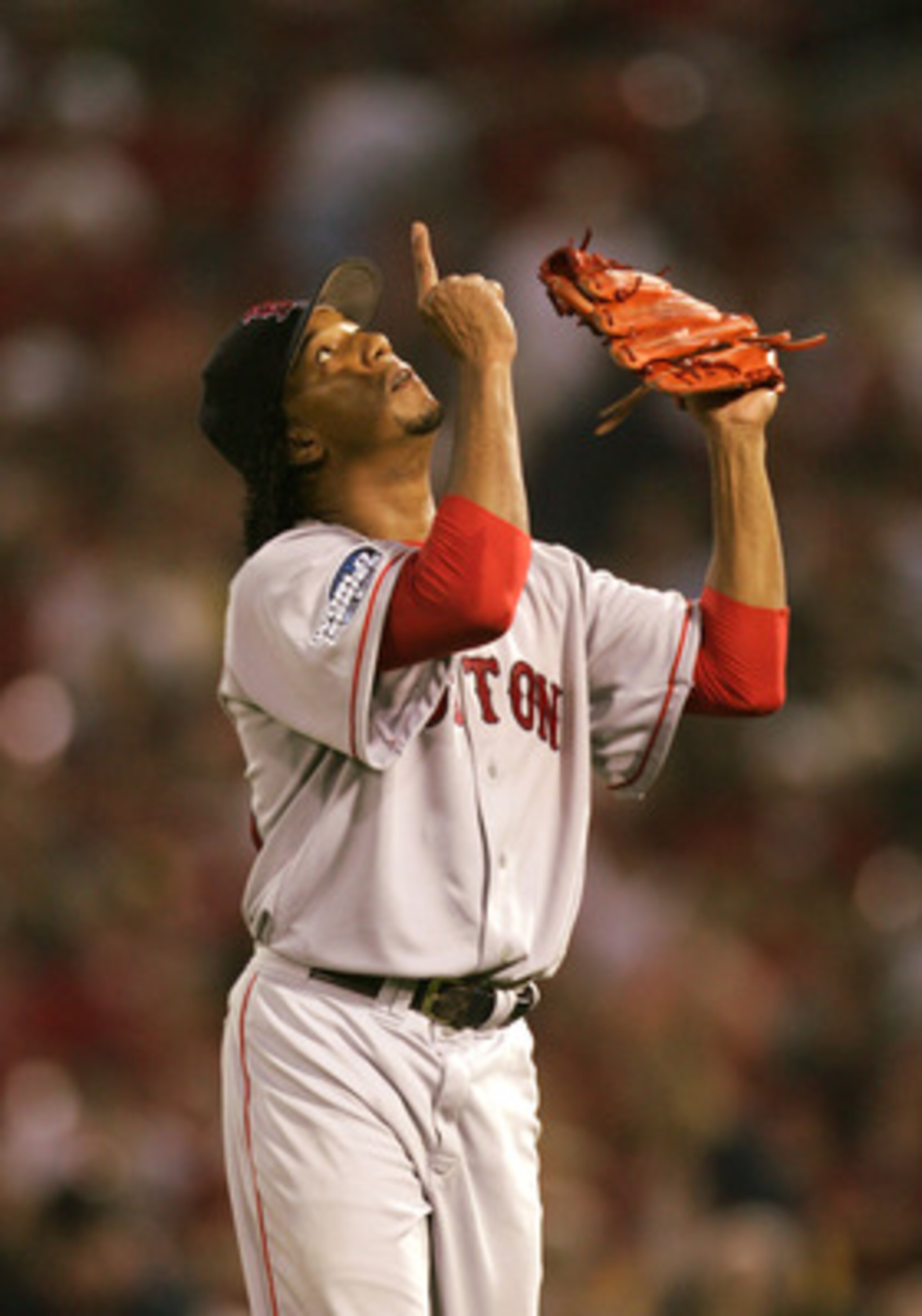 ST LOUIS - OCTOBER 26: Pedro Martinez #45 of the Boston Red Sox points the sky after being taken out of game three of the World Series against the St. Louis Cardinals on October 26, 2004 at Busch Stadium in St. Louis, Missouri. (Photo by Al Bello/Getty I ST LOUIS - OCTOBER 26: Pedro Martinez #45 of the Boston Red Sox points the sky after being taken out of game three of the World Series against the St. Louis Cardinals on October 26, 2004 at Busch Stadium in St. Louis, Missouri. (Photo by Al Bello/Getty I
