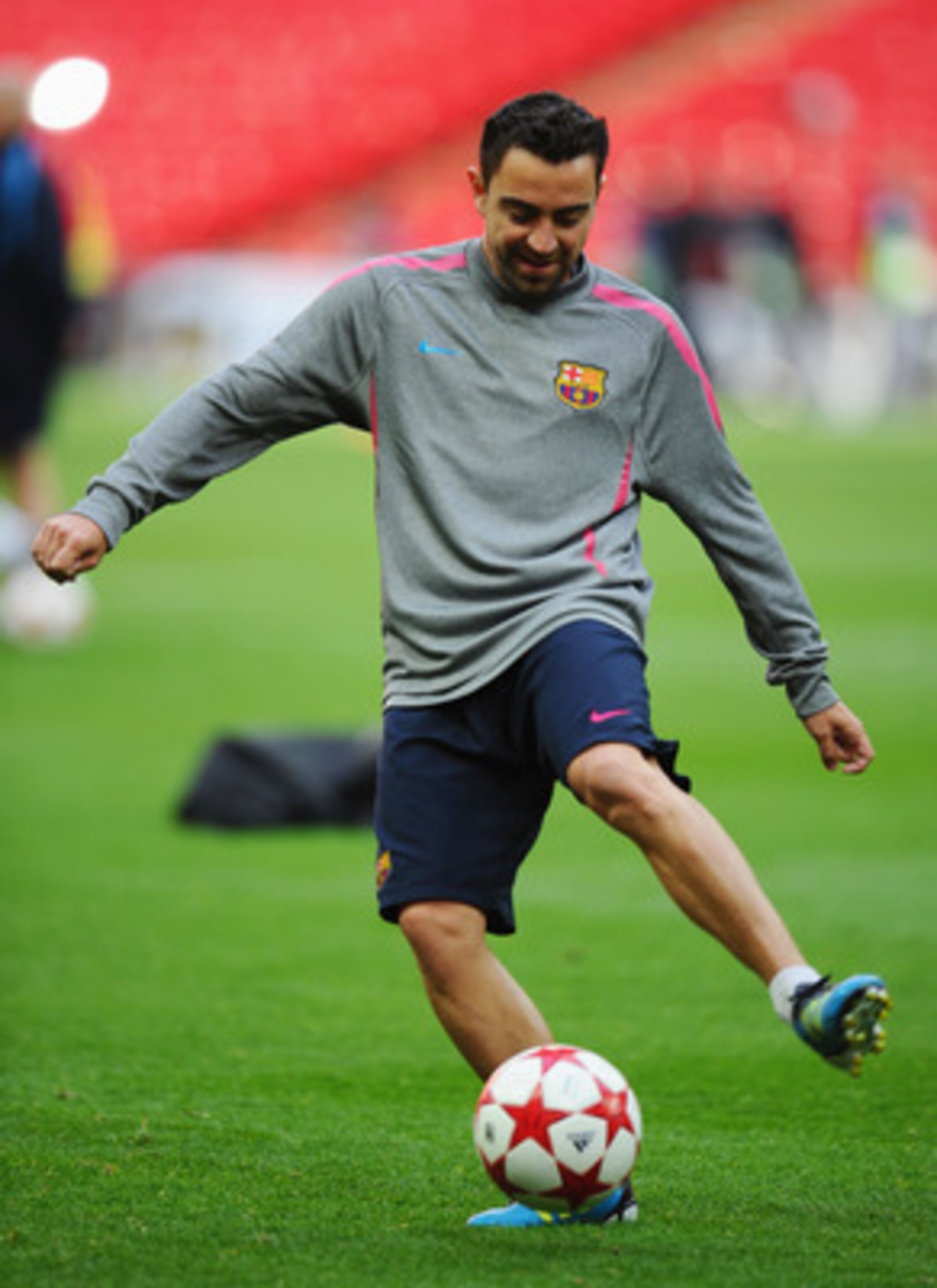 LONDON, ENGLAND - MAY 27:  Xavi of FC Barcelona controls the ball during a Barcelona training session prior to the UEFA Champions League final versus Manchester United at Wembley Stadium on May 27, 2011 in London, England.  (Photo by Clive Mason/Getty Ima