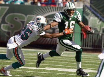 EAST RUTHERFORD, NJ - SEPTEMBER 23: Brad Smith #16 of the New York Jets runs with the ball against Will Allen #25 of the Miami Dolphins during their game on September 23, 2007 at Giants Stadium in East Rutherford, New Jersey. The Jets defeated the Dolphin