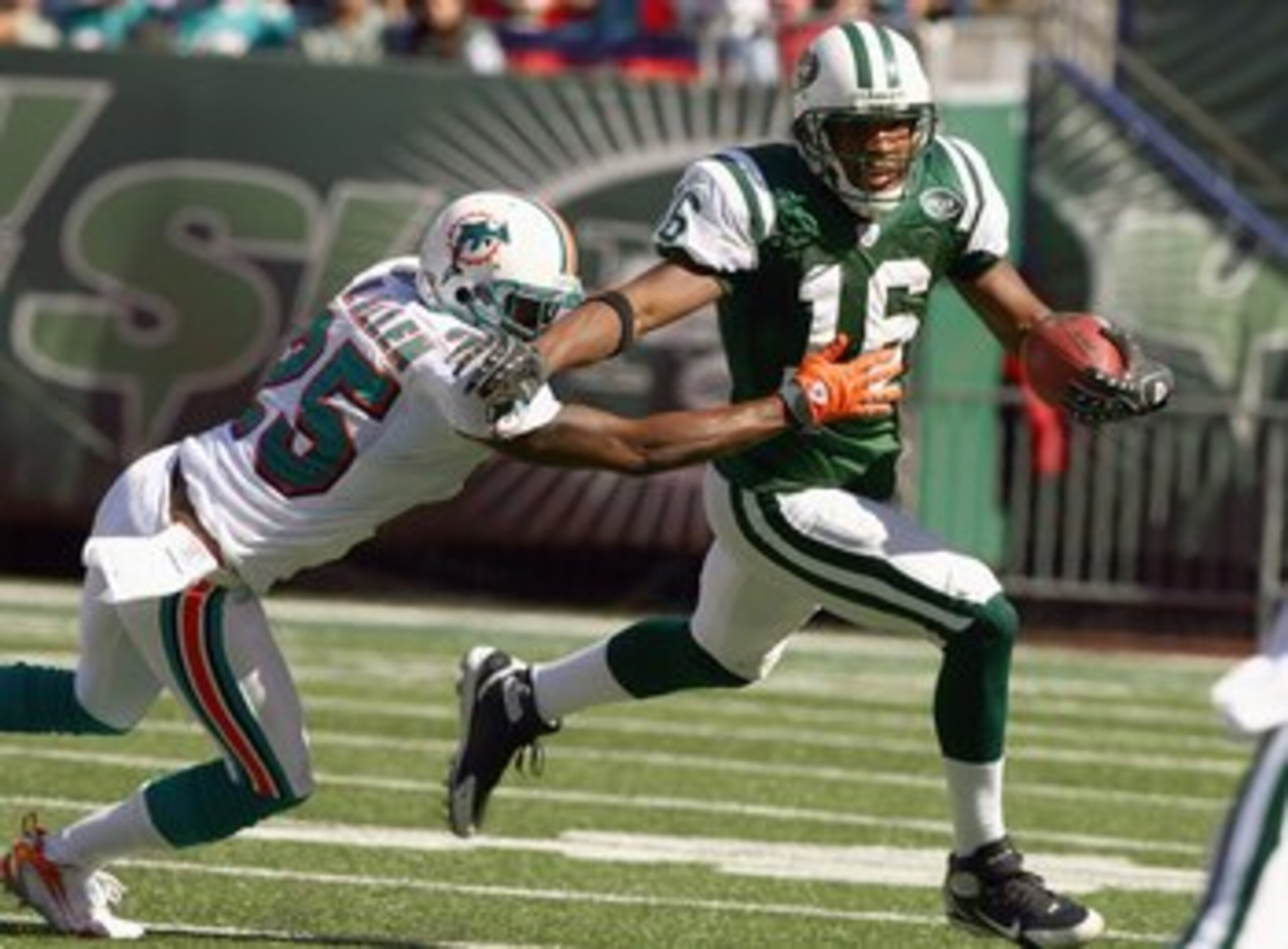 EAST RUTHERFORD, NJ - SEPTEMBER 23: Brad Smith #16 of the New York Jets runs with the ball against Will Allen #25 of the Miami Dolphins during their game on September 23, 2007 at Giants Stadium in East Rutherford, New Jersey. The Jets defeated the Dolphin