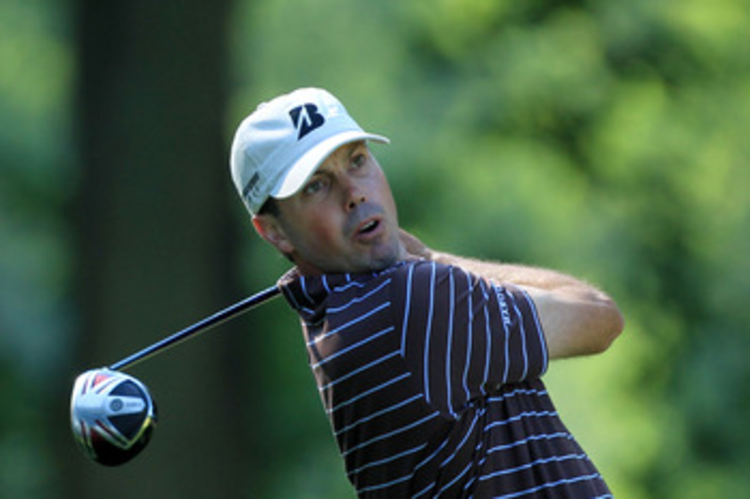 BETHESDA, MD - JUNE 15: Matt Kuchar watches a shot during a practice round prior to the start of the 111th U.S. Open at Congressional Country Club on June 15, 2011 in Bethesda, Maryland. (Photo by David Cannon/Getty Images) BETHESDA, MD - JUNE 15: Matt Kuchar watches a shot during a practice round prior to the start of the 111th U.S. Open at Congressional Country Club on June 15, 2011 in Bethesda, Maryland. (Photo by David Cannon/Getty Images)