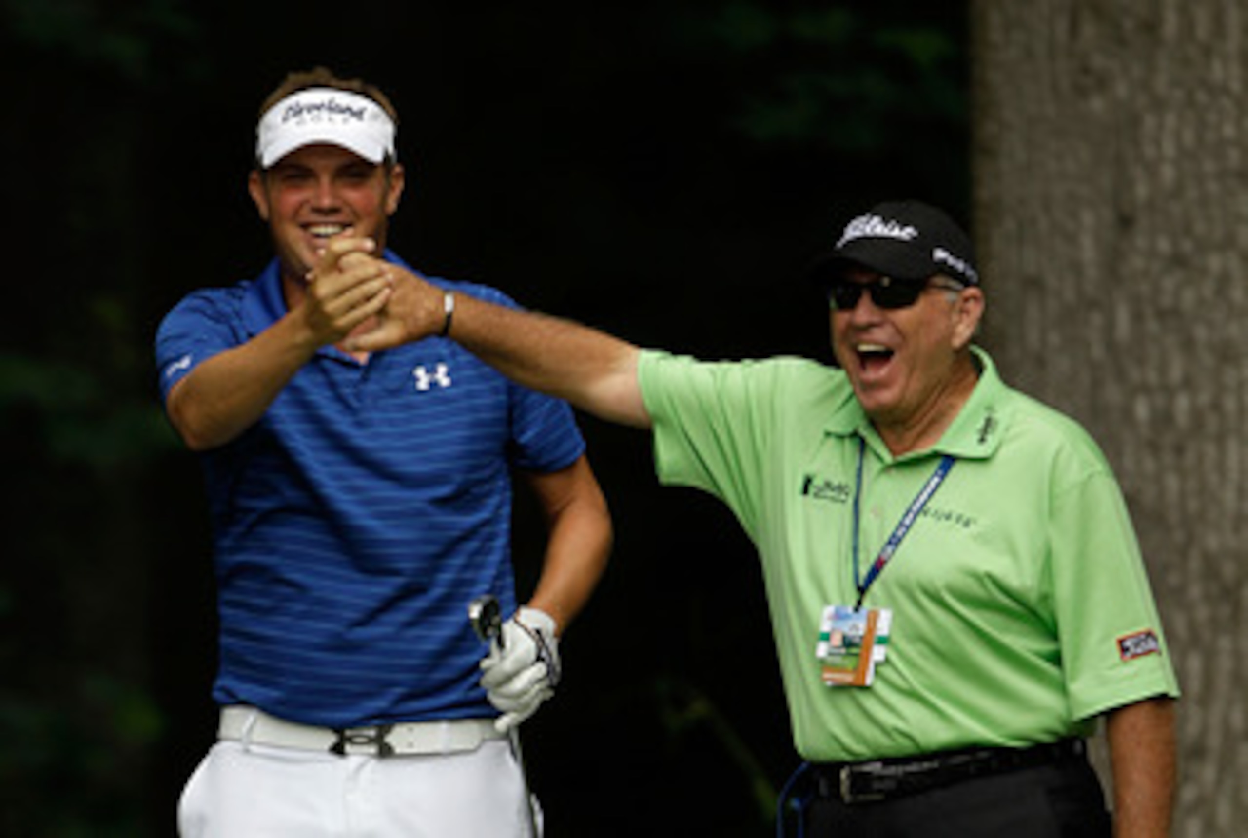 BETHESDA, MD - JUNE 14: Jeff Overton celebrates a hole-in-one on the 13th hole with Butch Harmon during a practice round prior to the start of the 111th U.S. Open at Congressional Country Club on June 14, 2011 in Bethesda, Maryland. (Photo by Rob Carr/G BETHESDA, MD - JUNE 14: Jeff Overton celebrates a hole-in-one on the 13th hole with Butch Harmon during a practice round prior to the start of the 111th U.S. Open at Congressional Country Club on June 14, 2011 in Bethesda, Maryland. (Photo by Rob Carr/G