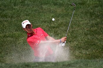 BETHESDA, MD - JUNE 15:  Matteo Manassero of Italy plays a bunker shot during a practice round prior to the start of the 111th U.S. Open at Congressional Country Club on June 15, 2011 in Bethesda, Maryland.  (Photo by Ross Kinnaird/Getty Images)