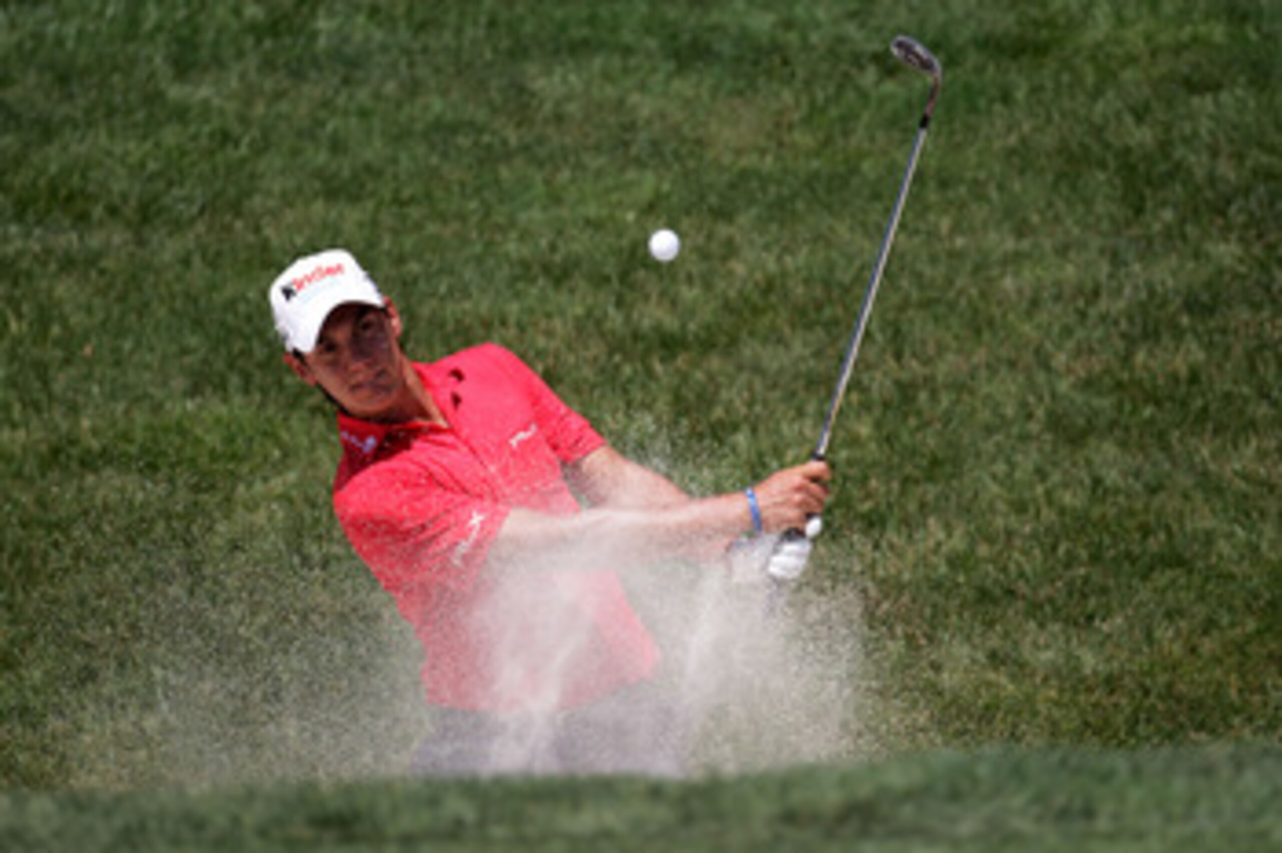 BETHESDA, MD - JUNE 15: Matteo Manassero of Italy plays a bunker shot during a practice round prior to the start of the 111th U.S. Open at Congressional Country Club on June 15, 2011 in Bethesda, Maryland. (Photo by Ross Kinnaird/Getty Images) BETHESDA, MD - JUNE 15: Matteo Manassero of Italy plays a bunker shot during a practice round prior to the start of the 111th U.S. Open at Congressional Country Club on June 15, 2011 in Bethesda, Maryland. (Photo by Ross Kinnaird/Getty Images)