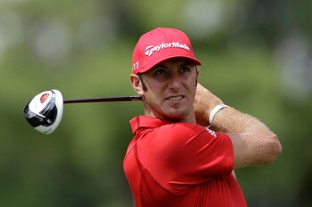 BETHESDA, MD - JUNE 14:  Dustin Johnson hits a shot during a practice round prior to the start of the 111th U.S. Open at Congressional Country Club on June 14, 2011 in Bethesda, Maryland.  (Photo by Rob Carr/Getty Images)