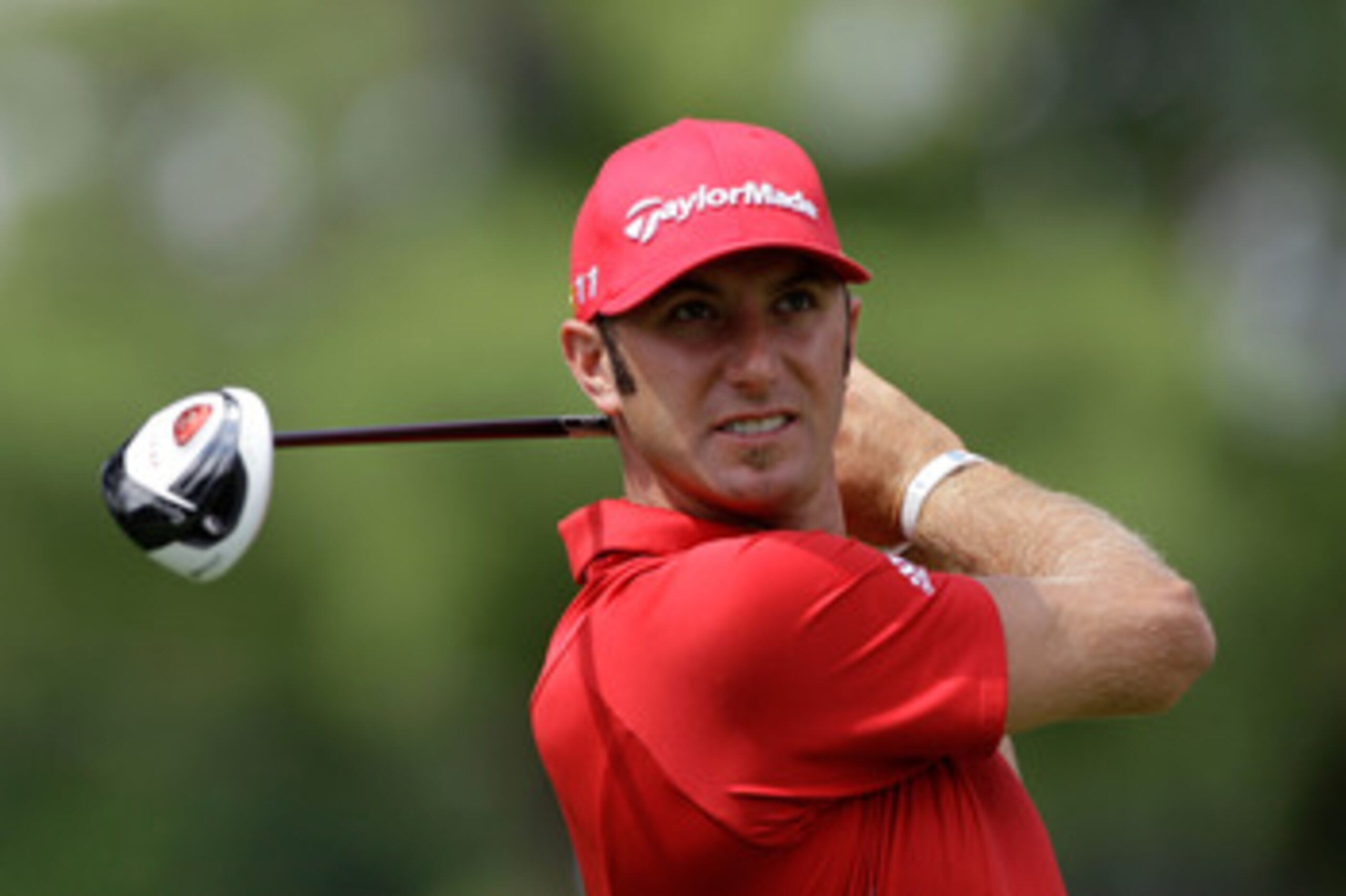 BETHESDA, MD - JUNE 14: Dustin Johnson hits a shot during a practice round prior to the start of the 111th U.S. Open at Congressional Country Club on June 14, 2011 in Bethesda, Maryland. (Photo by Rob Carr/Getty Images) BETHESDA, MD - JUNE 14: Dustin Johnson hits a shot during a practice round prior to the start of the 111th U.S. Open at Congressional Country Club on June 14, 2011 in Bethesda, Maryland. (Photo by Rob Carr/Getty Images)
