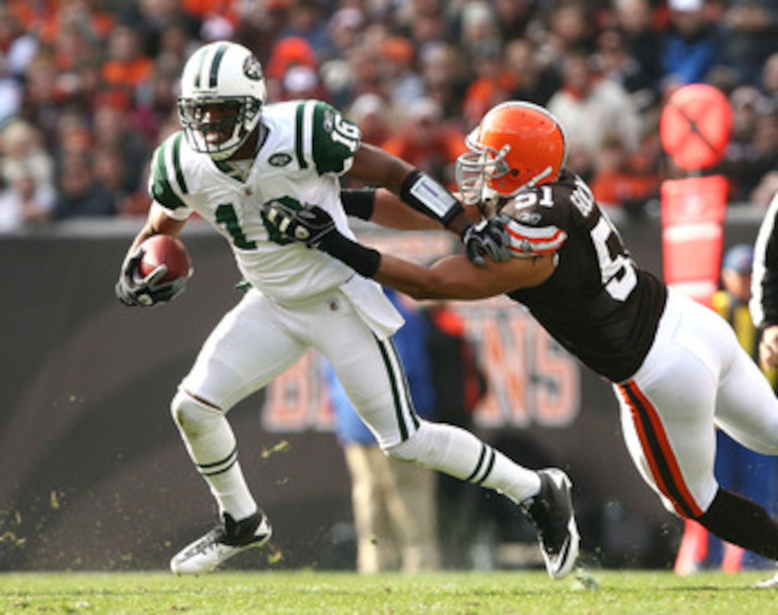 CLEVELAND - NOVEMBER 14:  Wide receiver Brad Smith #16 of the New York Jets runs the ball by linebacker Chris Gocong #51 of the Cleveland Browns at Cleveland Browns Stadium on November 14, 2010 in Cleveland, Ohio.  (Photo by Matt Sullivan/Getty Images)