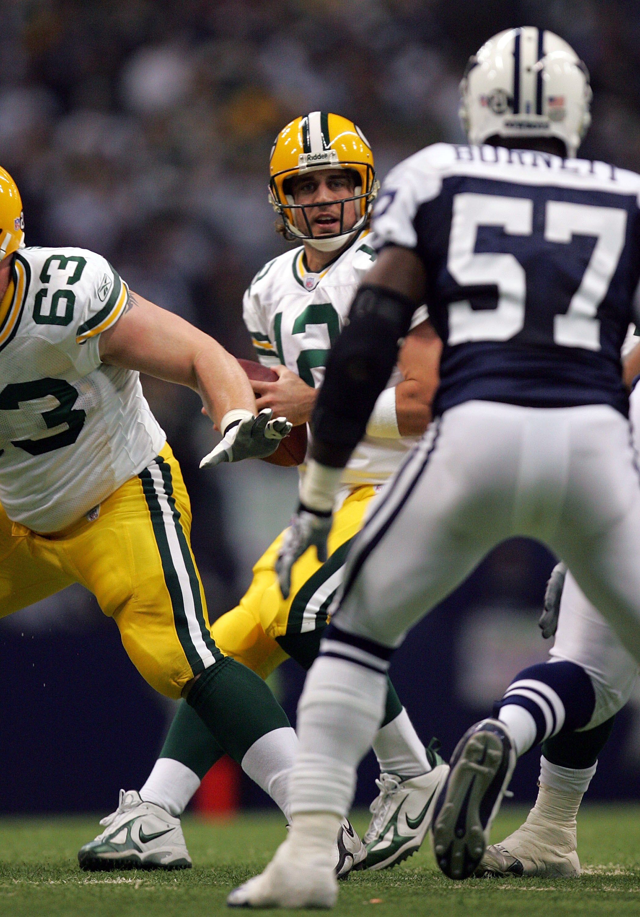 IRVING, TX - NOVEMBER 29: Quarterback Aaron Rodgers #12 of the Green Bay Packers drops back to pass against the Dallas Cowboys at Texas Stadium on November 29, 2007 in Irving, Texas  (Photo by Ronald Martinez/Getty Images)