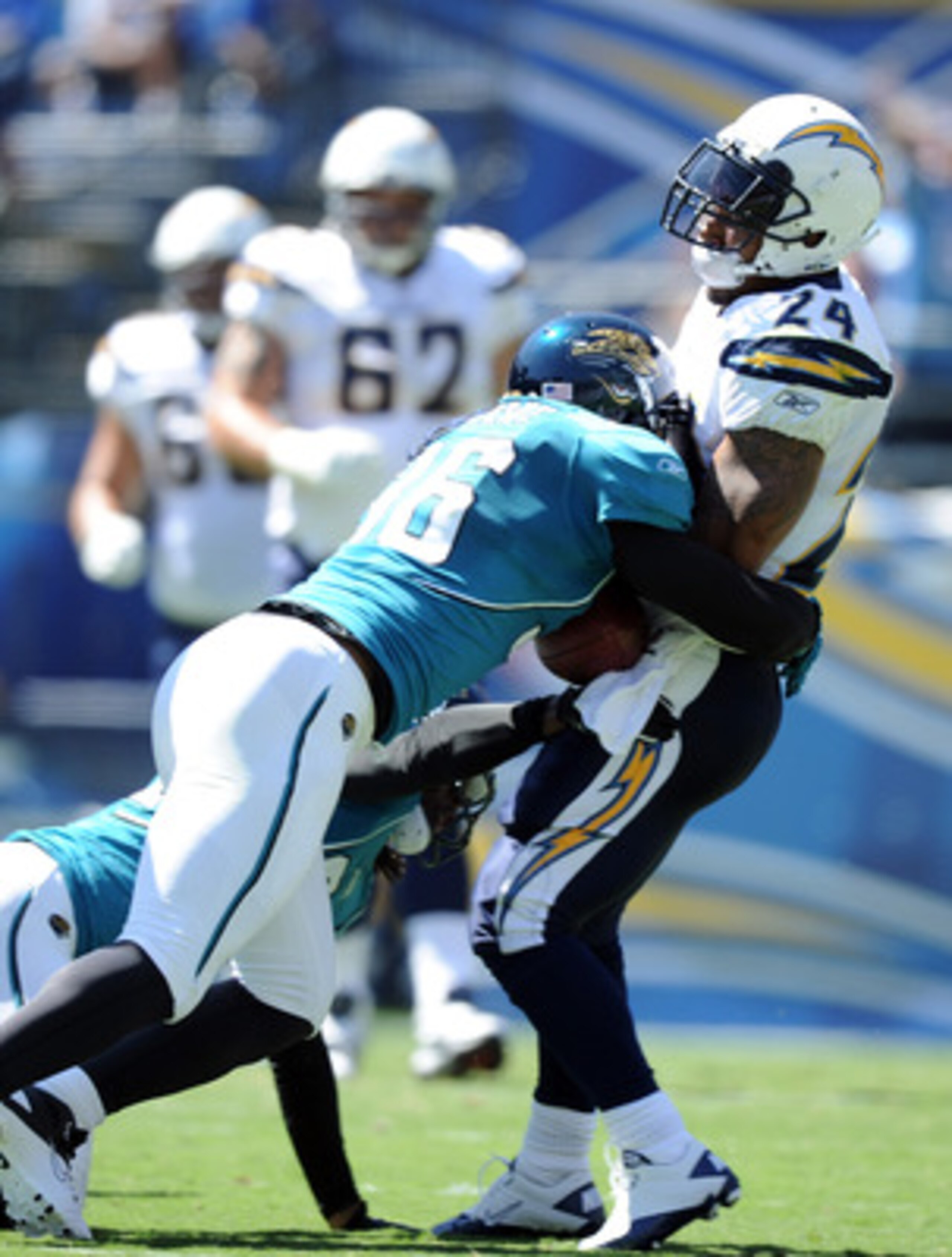 SAN DIEGO - SEPTEMBER 19:  Ryan Mathews #24 of the San Diego Chargers fumbles the ball as he is hit by Courtney Greene #36 of the Jacksonville Jaguars during the first quarter at Qualcomm Stadium on September 19, 2010 in San Diego, California.  (Photo by