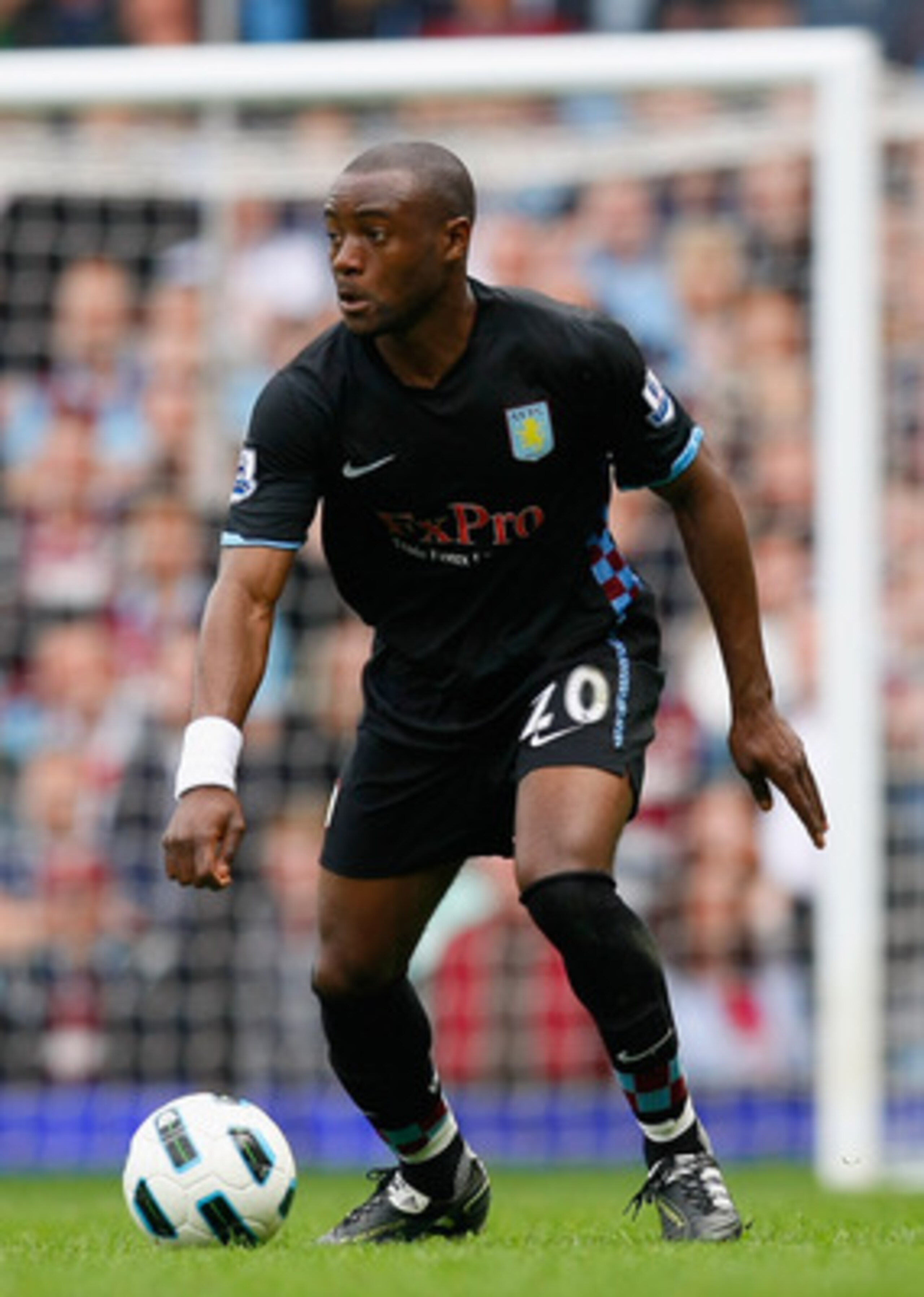 LONDON, ENGLAND - APRIL 16:  Nigel Reo-Coker of Aston Villa runs with the ball during the Barclays Premier League match between West Ham United and Aston Villa at the Boleyn Ground on April 16, 2011 in London, England.  (Photo by Tom Dulat/Getty Images)