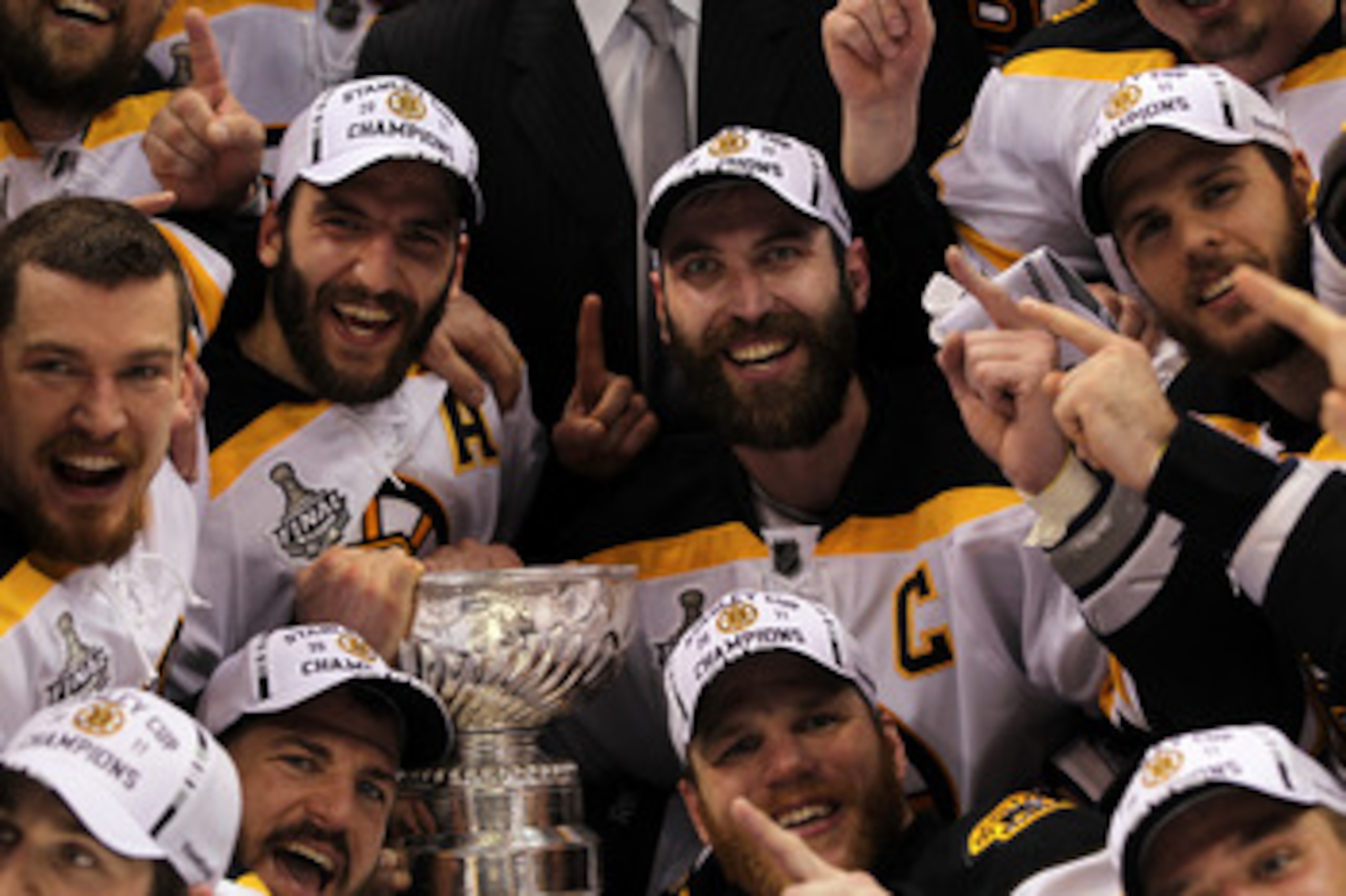 VANCOUVER, BC - JUNE 15: Patrice Bergeron #37, Andrew Ference #21, Mark Recchi #28, Shawn Thornton #22 and Zdeno Chara #33 of the Boston Bruins pose with the Stanley Cup after defeating the Vancouver Canucks in Game Seven of the 2011 NHL Stanley Cup Fina VANCOUVER, BC - JUNE 15: Patrice Bergeron #37, Andrew Ference #21, Mark Recchi #28, Shawn Thornton #22 and Zdeno Chara #33 of the Boston Bruins pose with the Stanley Cup after defeating the Vancouver Canucks in Game Seven of the 2011 NHL Stanley Cup Fina