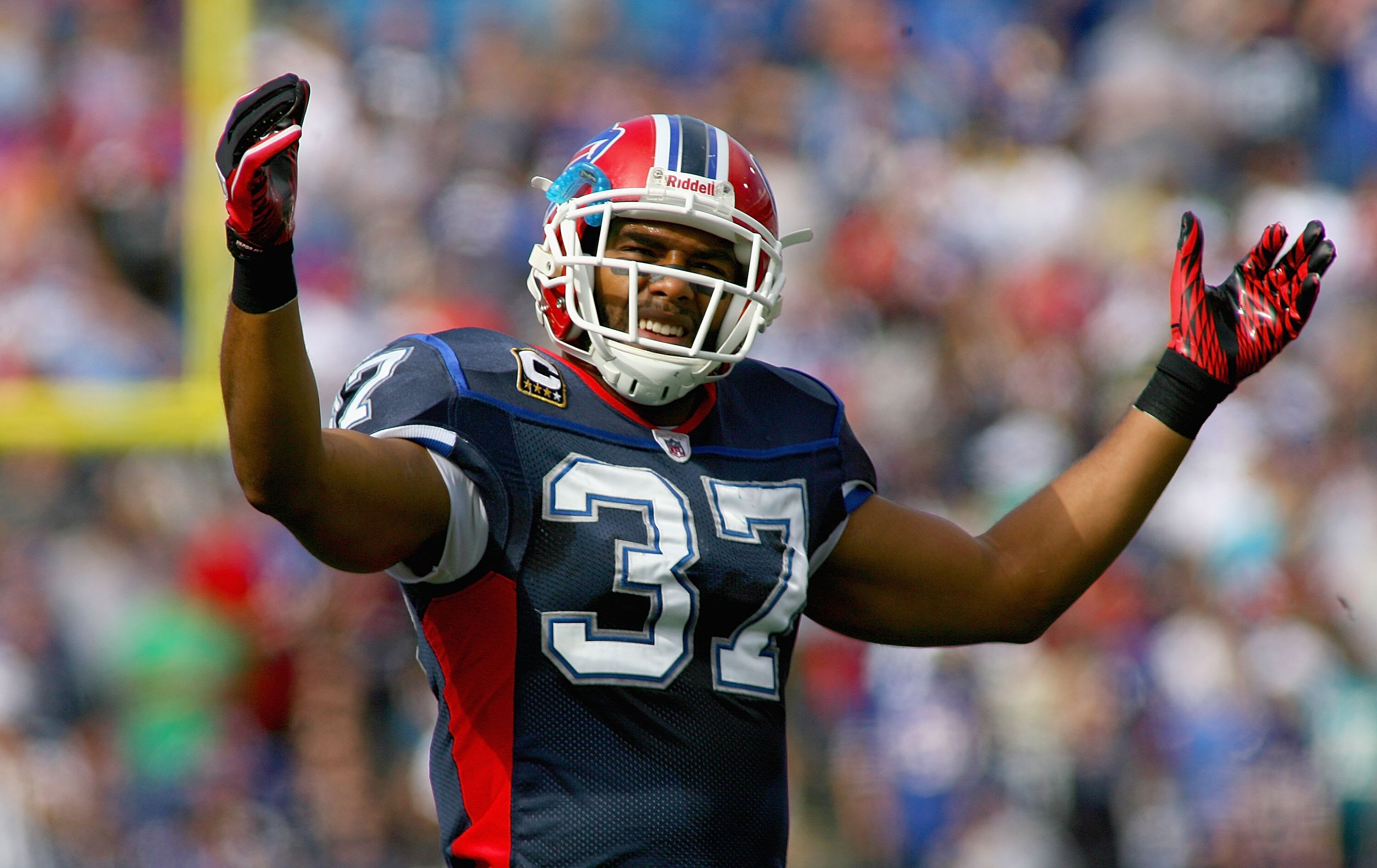 ORCHARD PARK, NY - OCTOBER 10: George Wilson #37 of the Buffalo Bills encourages the crowd against the Jacksonville Jaguars at Ralph Wilson Stadium on October 10, 2010 in Orchard Park, New York. Jacksonville won 36-26. (Photo by Rick Stewart/Getty Images)