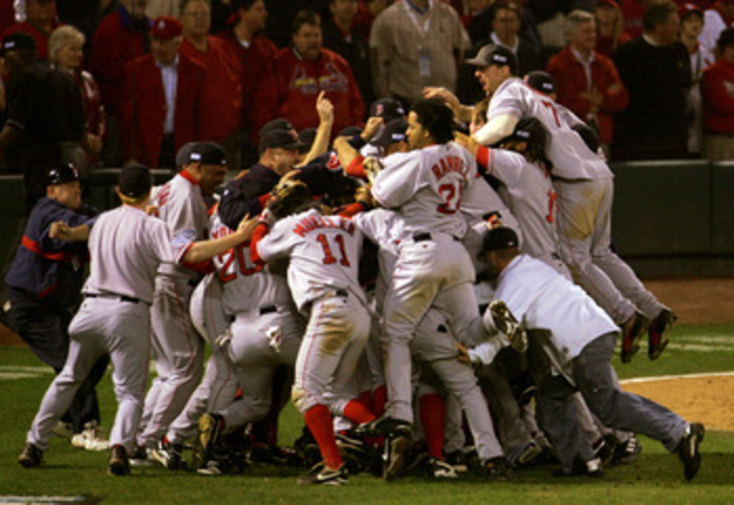 ST LOUIS - OCTOBER 27: The Boston Red Sox celebrate after defeating the St. Louis Cardinals 3-0 to win game four of the World Series on October 27, 2004 at Busch Stadium in St. Louis, Missouri. (Photo by Elsa/Getty Images) ST LOUIS - OCTOBER 27: The Boston Red Sox celebrate after defeating the St. Louis Cardinals 3-0 to win game four of the World Series on October 27, 2004 at Busch Stadium in St. Louis, Missouri. (Photo by Elsa/Getty Images)