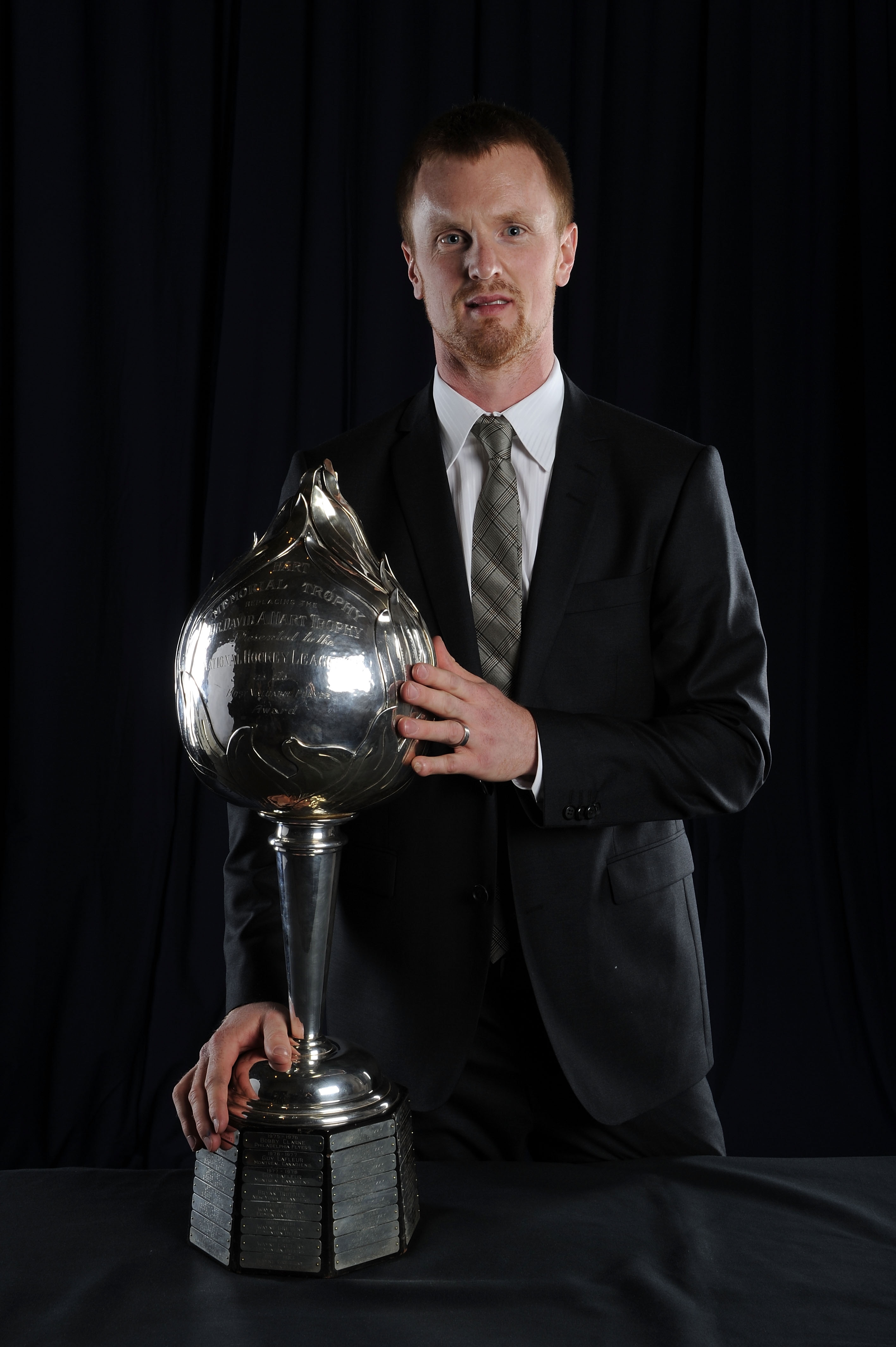 LAS VEGAS - JUNE 23:  Henrik Sedin of the Vancouver Canucks poses for a portrait with the Hart Memorial Trophy during the 2010 NHL Awards at the Palms Casino Resort on June 23, 2010 in Las Vegas, Nevada.  (Photo by Harry How/Getty Images)