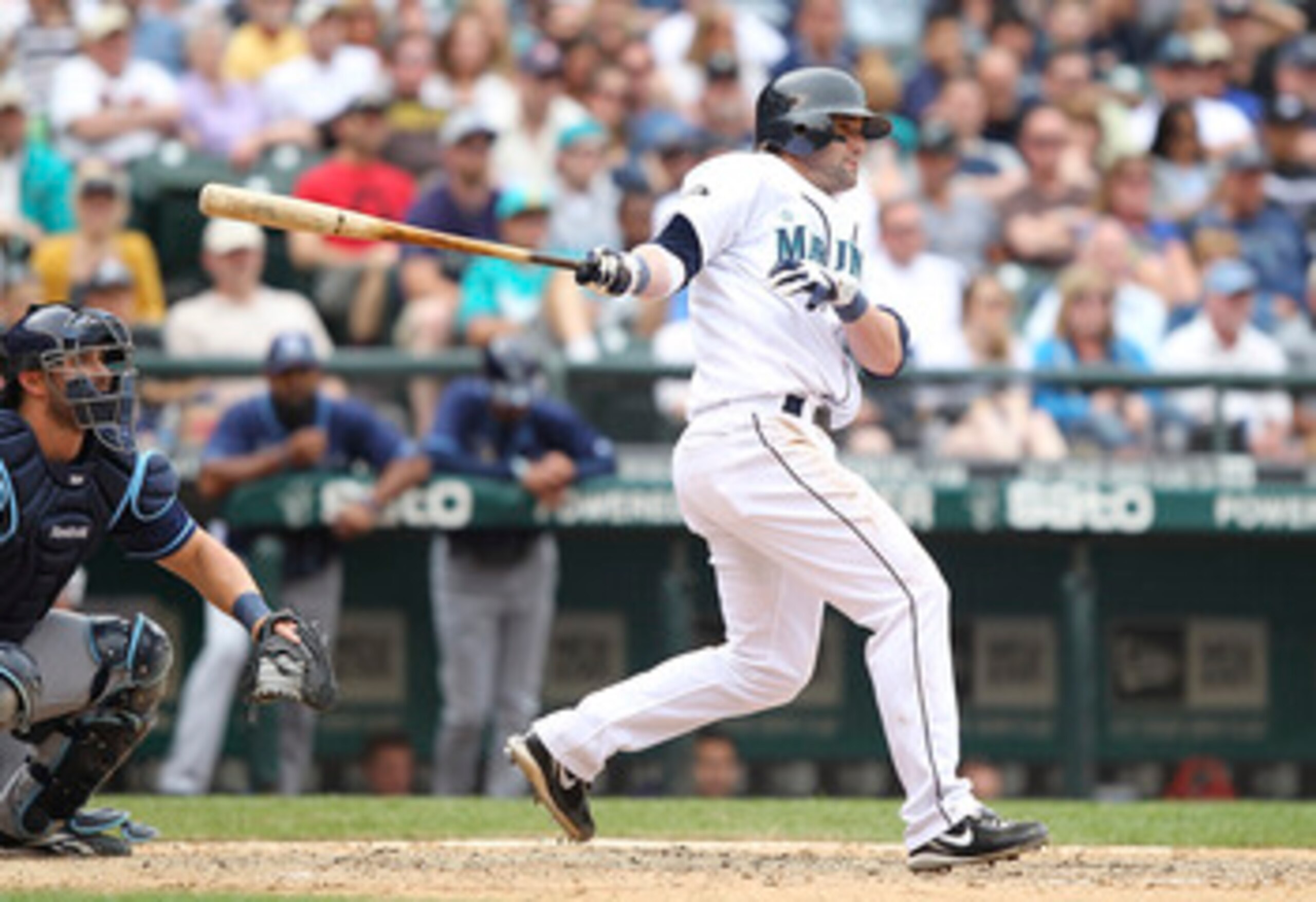 SEATTLE - JUNE 05:  Adam Kennedy #4 of the Seattle Mariners hits a game tying RBI single in the eighth against the Tampa Bay Rays at Safeco Field on June 5, 2011 in Seattle, Washington. (Photo by Otto Greule Jr/Getty Images)