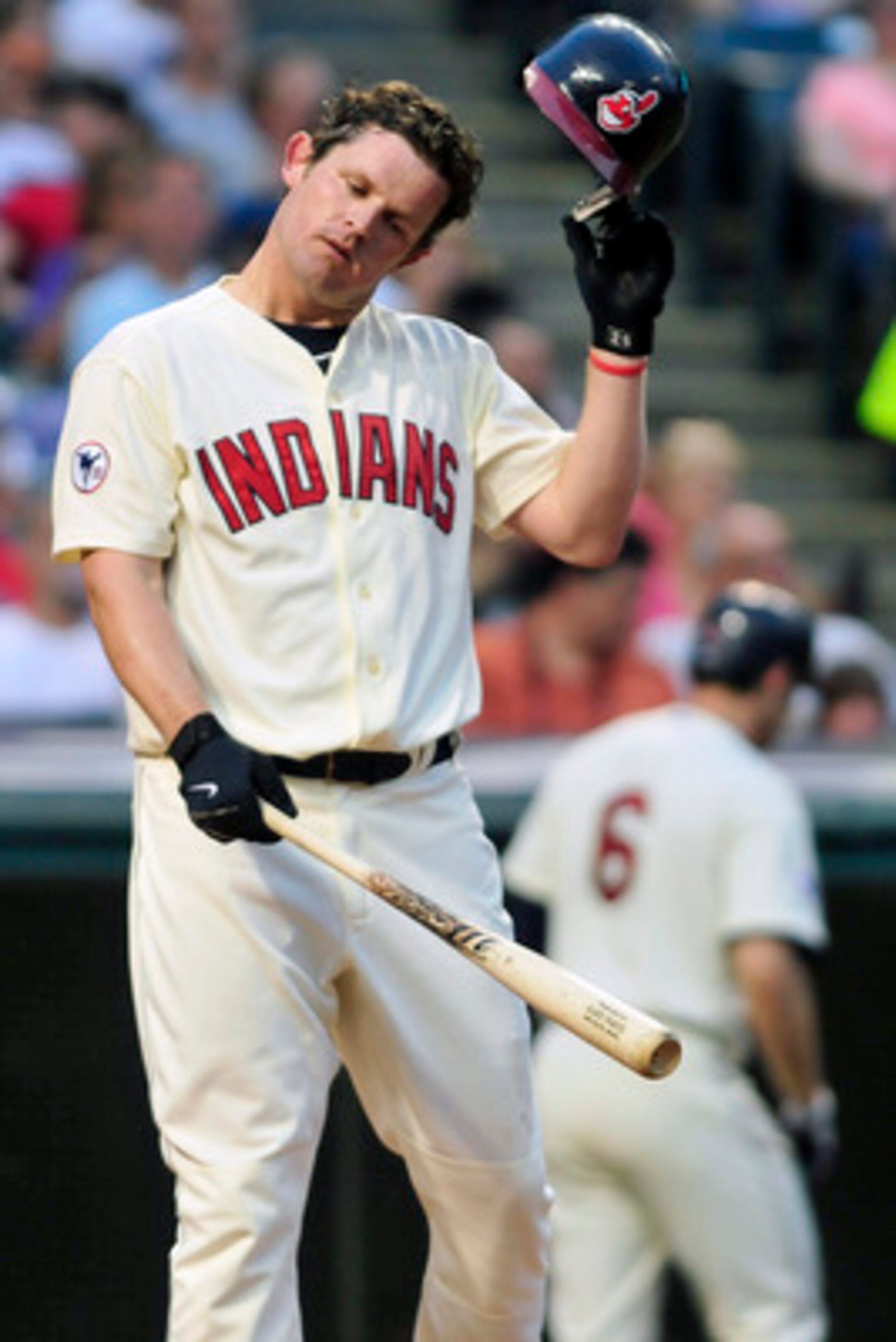 CLEVELAND, OH - JUNE 4: Austin Kearns #26 of the Cleveland Indians reacts after striking out to end the sixth inning against the Texas Rangers at Progressive Field on June 4, 2011 in Cleveland, Ohio. The Rangers defeated the Indians 4-0. (Photo by Jason M