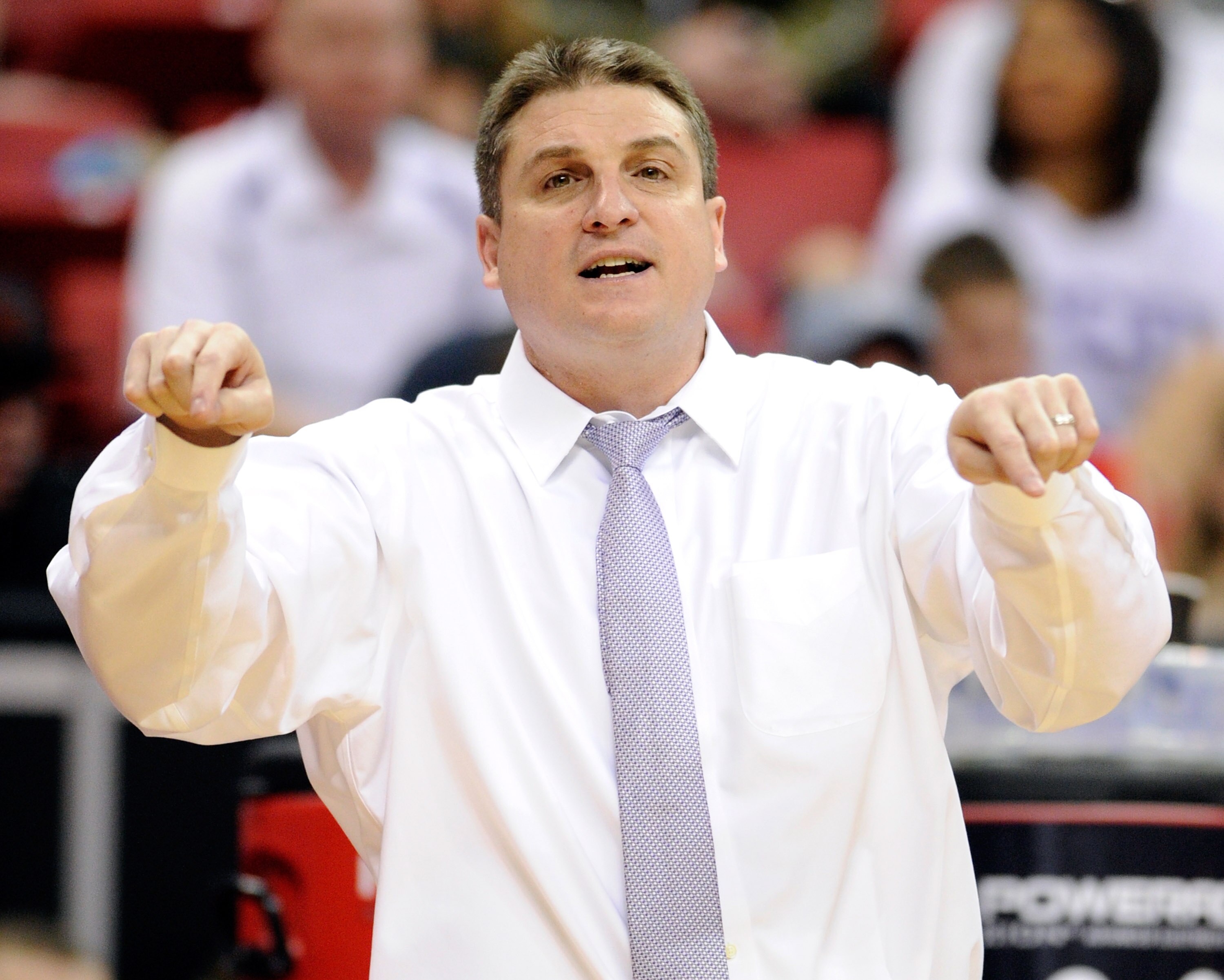 LAS VEGAS, NV - MARCH 09:  Head coach Jim Christian of the Texas Christian University Horned Frogs gestures as his team takes on the Wyoming Cowboys during the first round of the Conoco Mountain West Conference Basketball tournament at the Thomas & Mack C