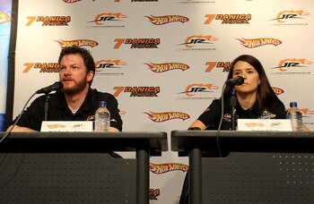 DAYTONA BEACH, FL - FEBRUARY 06: Team owner Dale Earnhardt Jr. (L) and Danica Patrick, driver of the #7 GoDaddy.com Chevrolet, speaks to the media prior to the ARCA Racing Series Lucas Oil Slick Mist 200 at Daytona International Speedway on February 6, 20