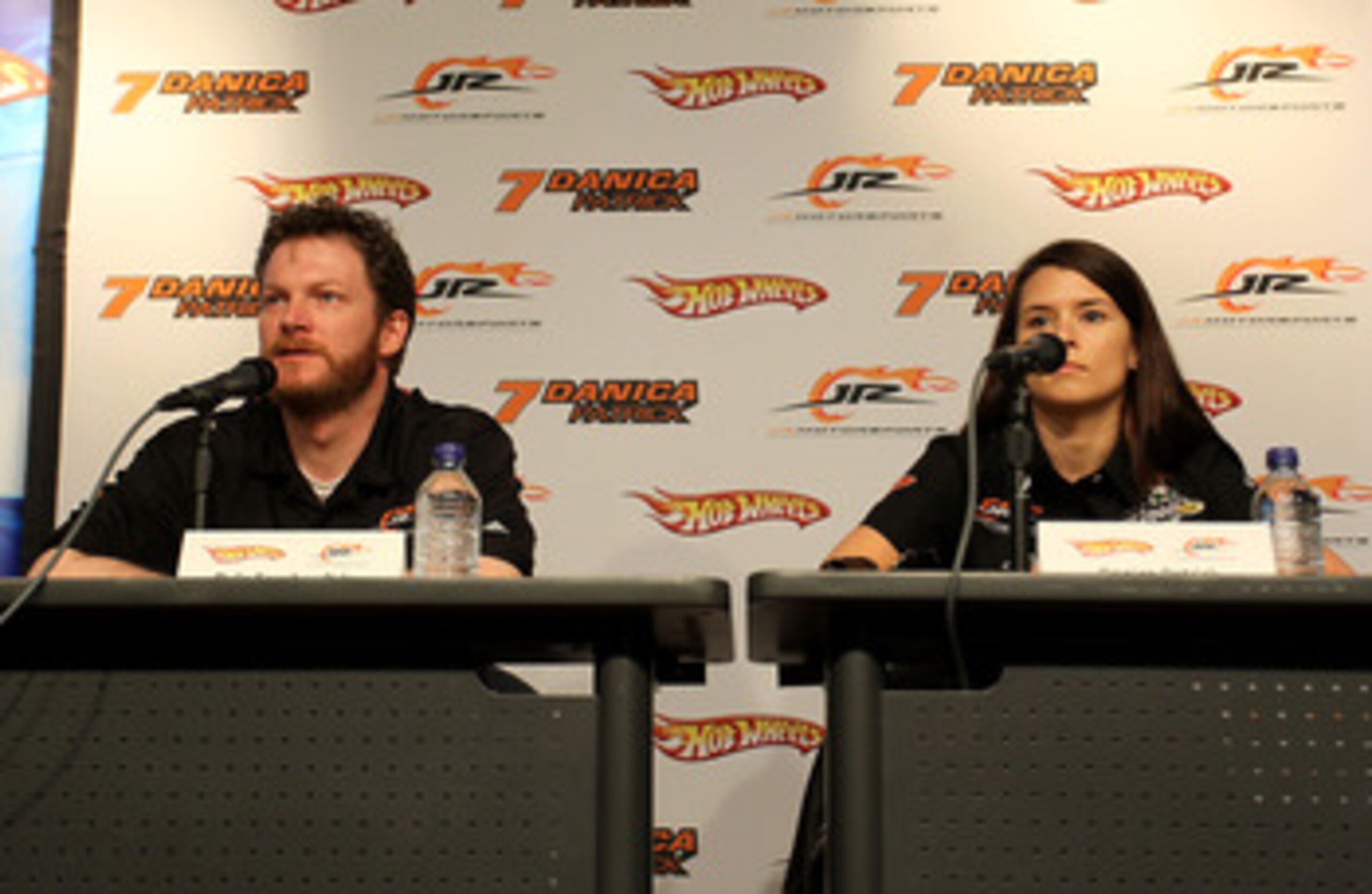 DAYTONA BEACH, FL - FEBRUARY 06: Team owner Dale Earnhardt Jr. (L) and Danica Patrick, driver of the #7 GoDaddy.com Chevrolet, speaks to the media prior to the ARCA Racing Series Lucas Oil Slick Mist 200 at Daytona International Speedway on February 6, 20 DAYTONA BEACH, FL - FEBRUARY 06: Team owner Dale Earnhardt Jr. (L) and Danica Patrick, driver of the #7 GoDaddy.com Chevrolet, speaks to the media prior to the ARCA Racing Series Lucas Oil Slick Mist 200 at Daytona International Speedway on February 6, 20