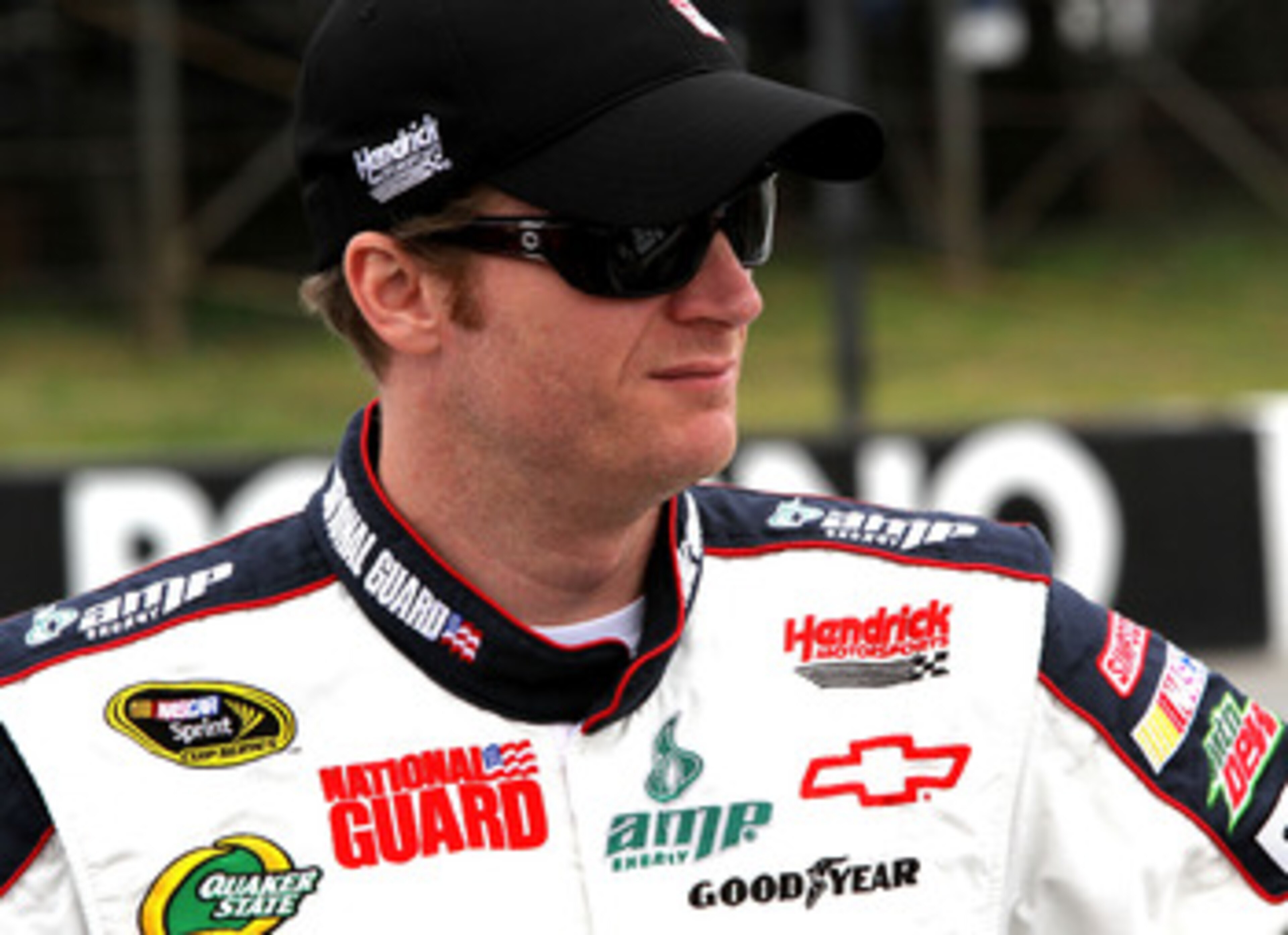LONG POND, PA - JUNE 12:  Dale Earnhardt Jr., driver of the #88 National Guard/Amp Energy Chevrolet, stands on the grid prior to the NASCAR Sprint Cup Series 5-Hour Energy 500 at Pocono Raceway on June 12, 2011 in Long Pond, Pennsylvania.  (Photo by Jerry