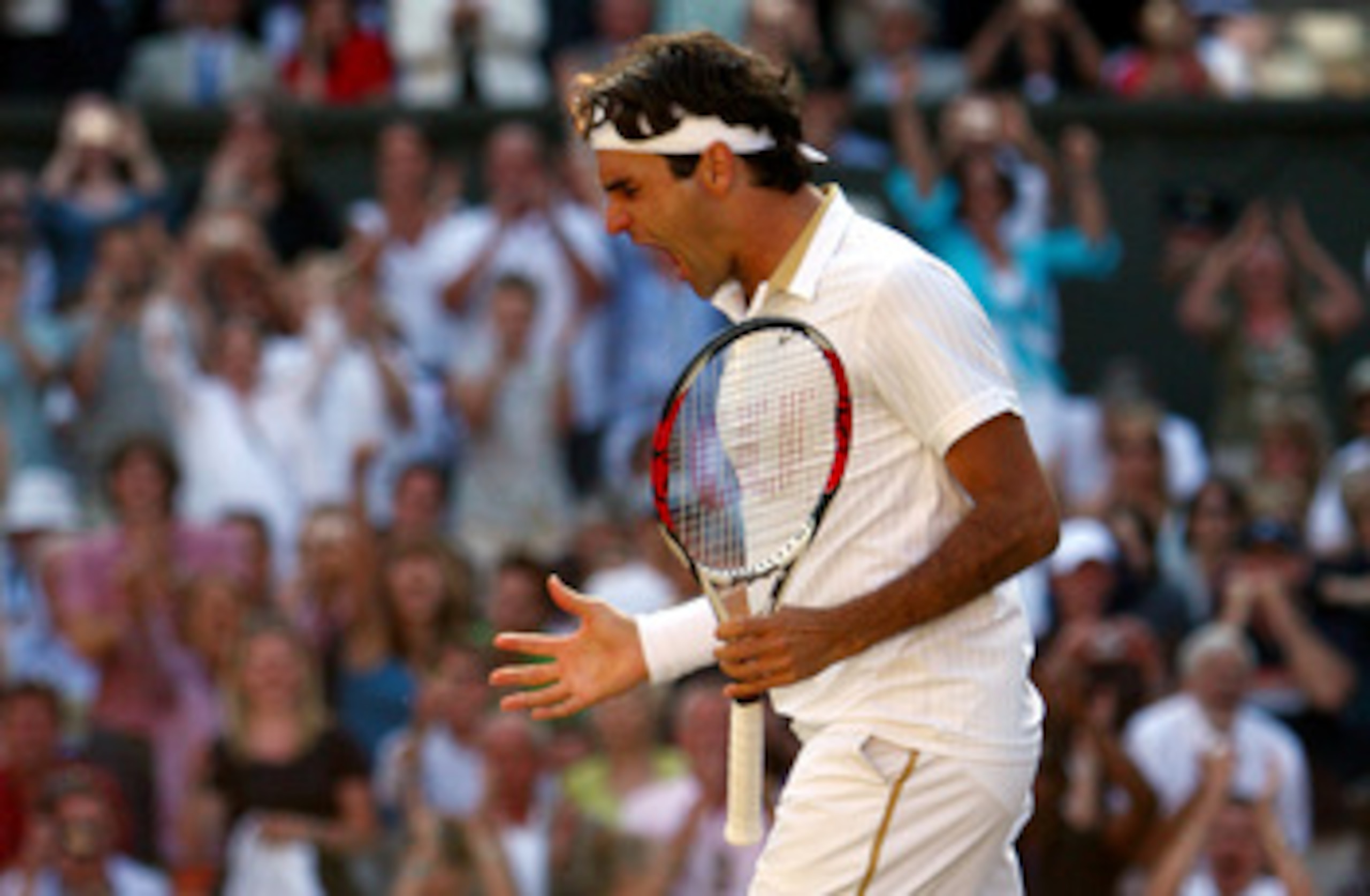 WIMBLEDON, ENGLAND - JULY 05:  Roger Federer of Switzerland celebrates victory during the men's singles final match against Andy Roddick of USA on Day Thirteen of the Wimbledon Lawn Tennis Championships at the All England Lawn Tennis and Croquet Club on J