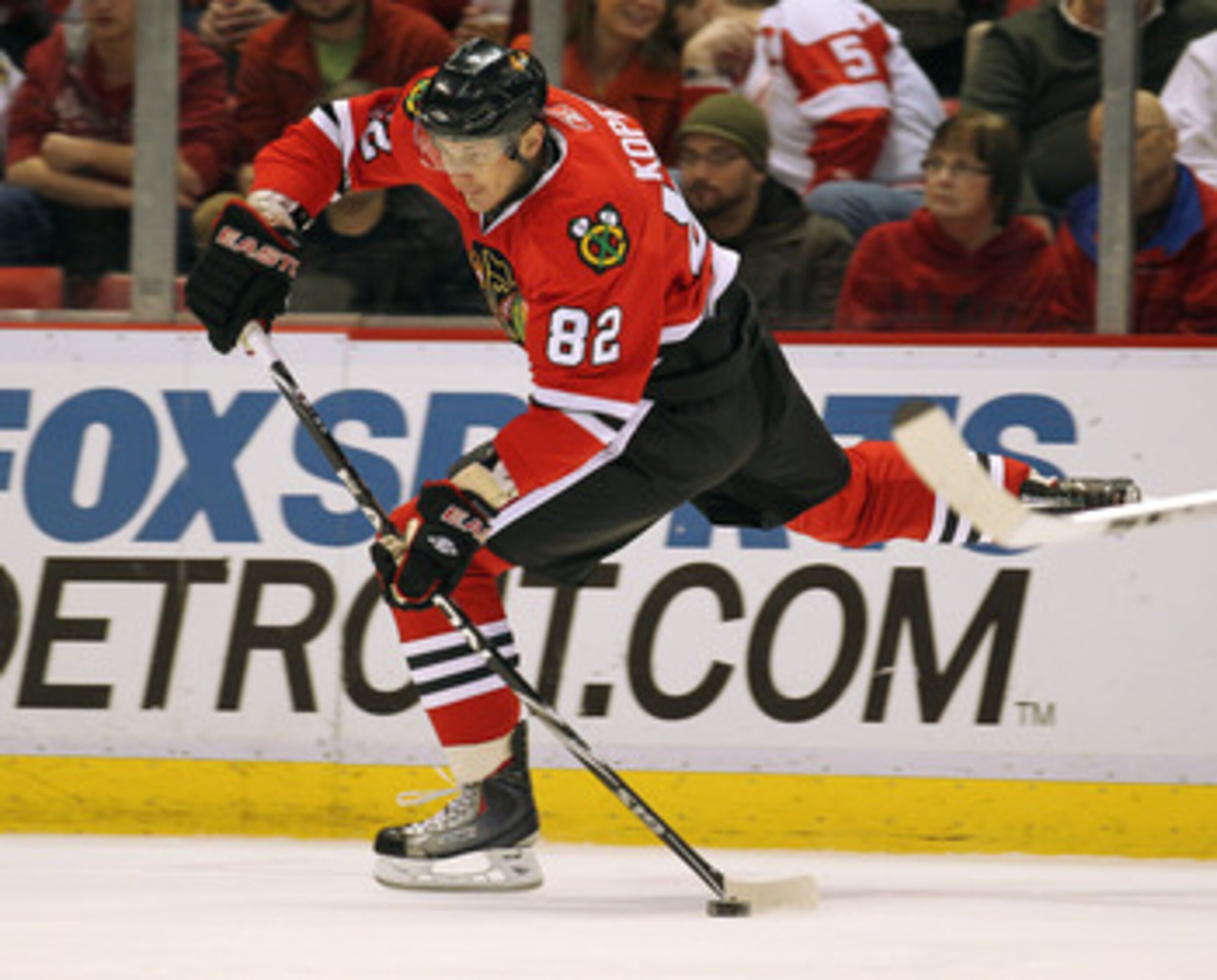 DETROIT, MI - JANUARY 22:  Tomas Kopecky #82 of the Chicago Black Hawks lets a shot go in a game against the Detroit Red Wings on January 22, 2011 at the Joe Louis Arena in Detroit, Michigan. The Hawks defeated the Wings 4-1. (Photo by Claus Andersen/Gett
