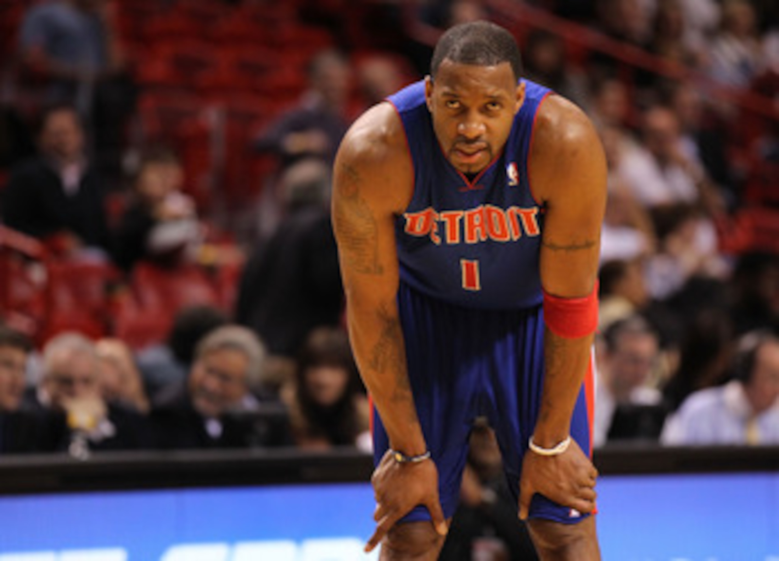 MIAMI, FL - JANUARY 28: Tracy McGrady #1 of of the Detroit Pistons looks on during a game against the Miami Heat at American Airlines Arena on January 28, 2011 in Miami, Florida. NOTE TO USER: User expressly acknowledges and agrees that, by downloading an