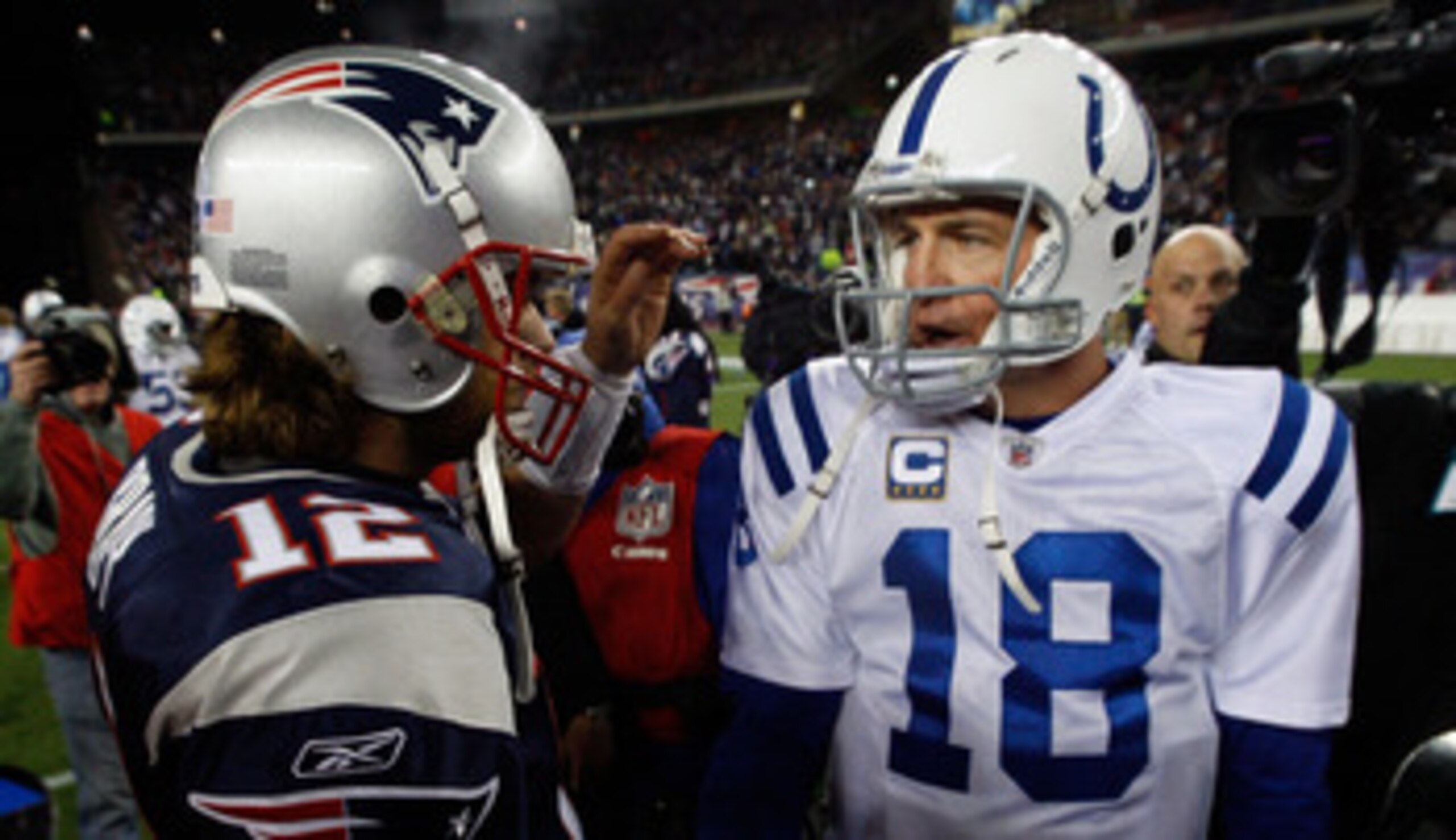 FOXBORO, MA - NOVEMBER 21:  Tom Brady #12 of the New England Patriots shakes hands with Peyton Manning #18 of the Indianapolis Colts after their game at Gillette Stadium on November 21, 2010 in Foxboro, Massachusetts. (Photo by Jim Rogash/Getty Images)