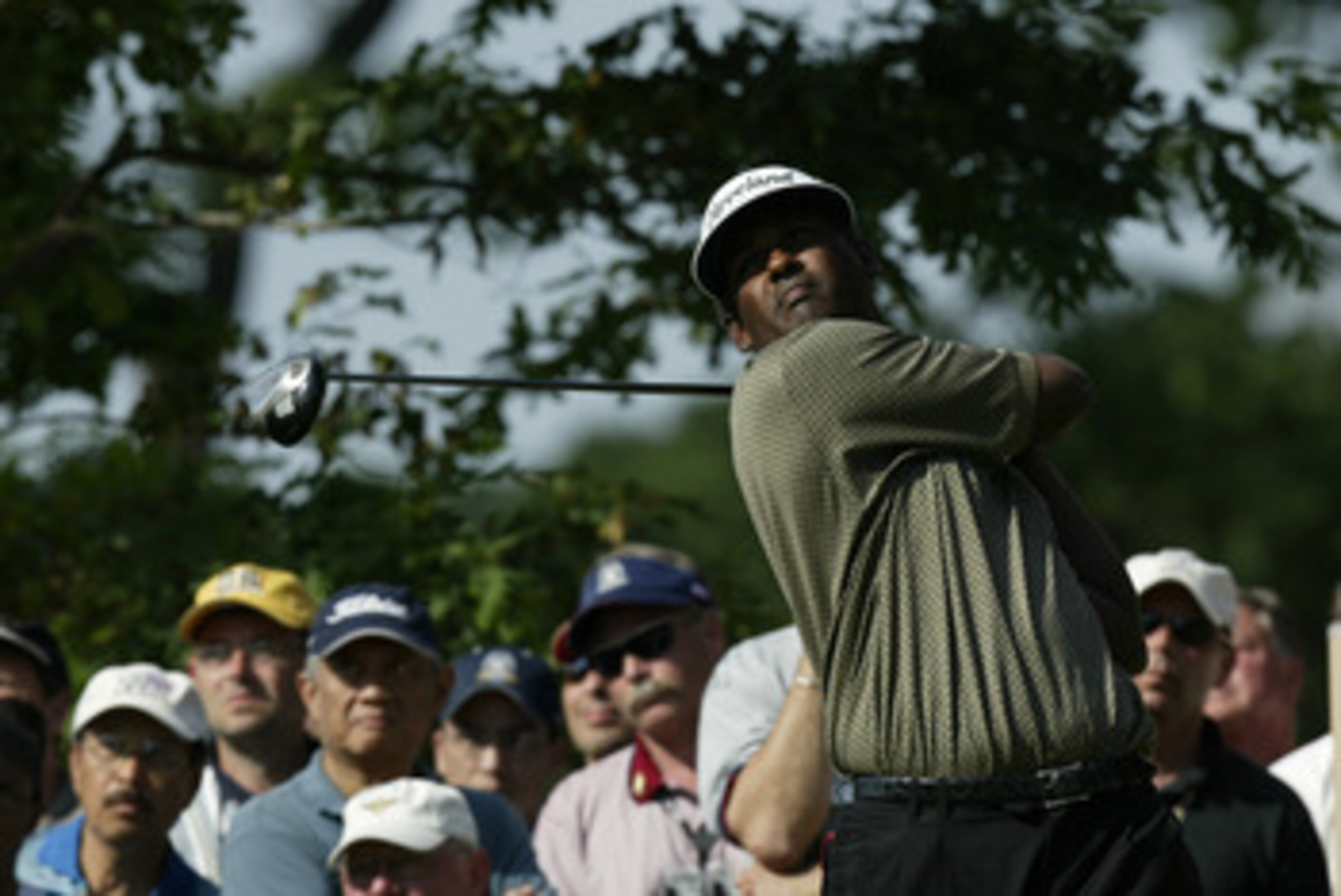OLYMPIA FIELDS, IL - JUNE 14:  Vijay Singh of Fiji hits his tee shot on the ninth green during the third round of the 2003 US Open on the North Course at the Olympia Fields Country Club on June 14, 2003 in Olympia Fields, Illinois.  (Photo by Craig Jones/