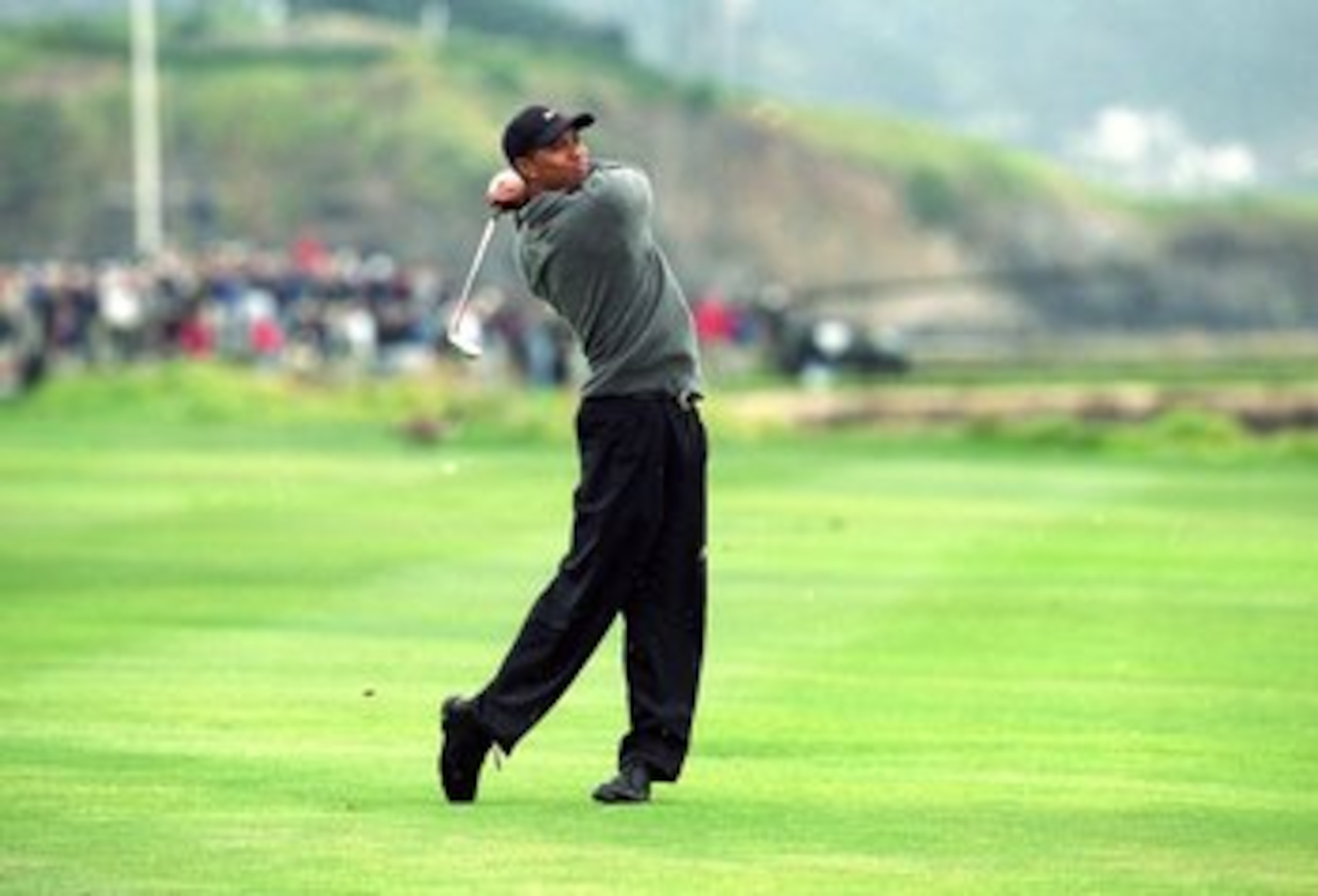 17 Jun 2000:  Tiger Woods follows his swing during the 100th US Open at the Pebble Beach Golf Links in Pebble Beach, California.Mandatory Credit: Jamie Squire  /Allsport