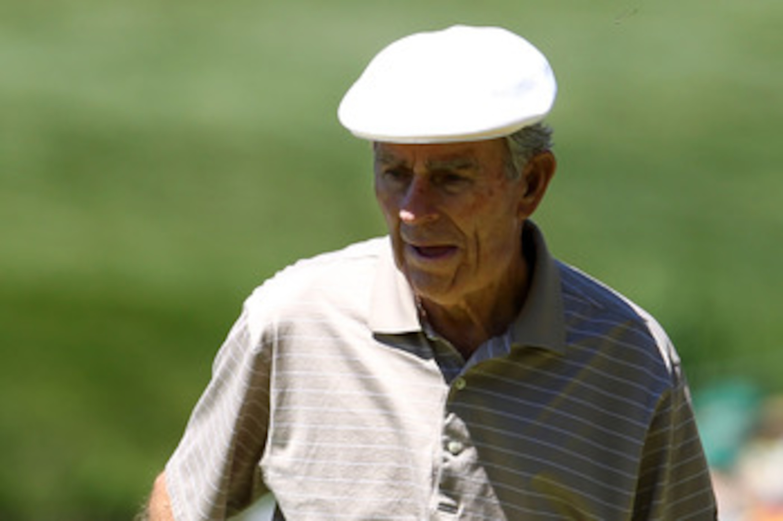 AUGUSTA, GA - APRIL 06:  Jack Fleck walks to a green during the Par 3 Contest prior to the 2011 Masters Tournament at Augusta National Golf Club on April 6, 2011 in Augusta, Georgia.  (Photo by Andrew Redington/Getty Images)