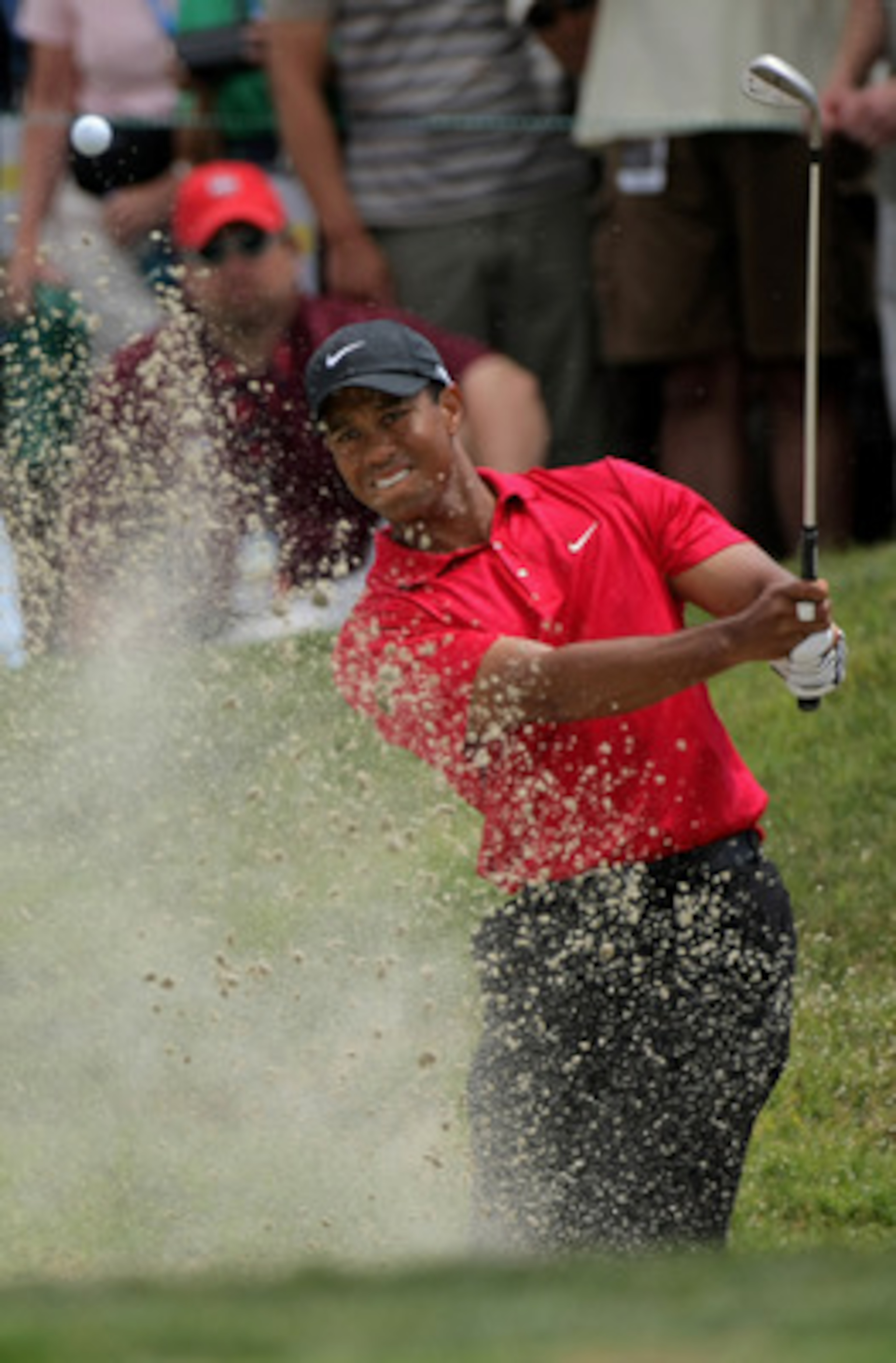 SAN DIEGO - JUNE 16:  Tiger Woods pitches out of a sandtrap as he takes his third shot on the ninth hole during the playoff round of the 108th U.S. Open at the Torrey Pines Golf Course (South Course) on June 16, 2008 in San Diego, California.  (Photo by D