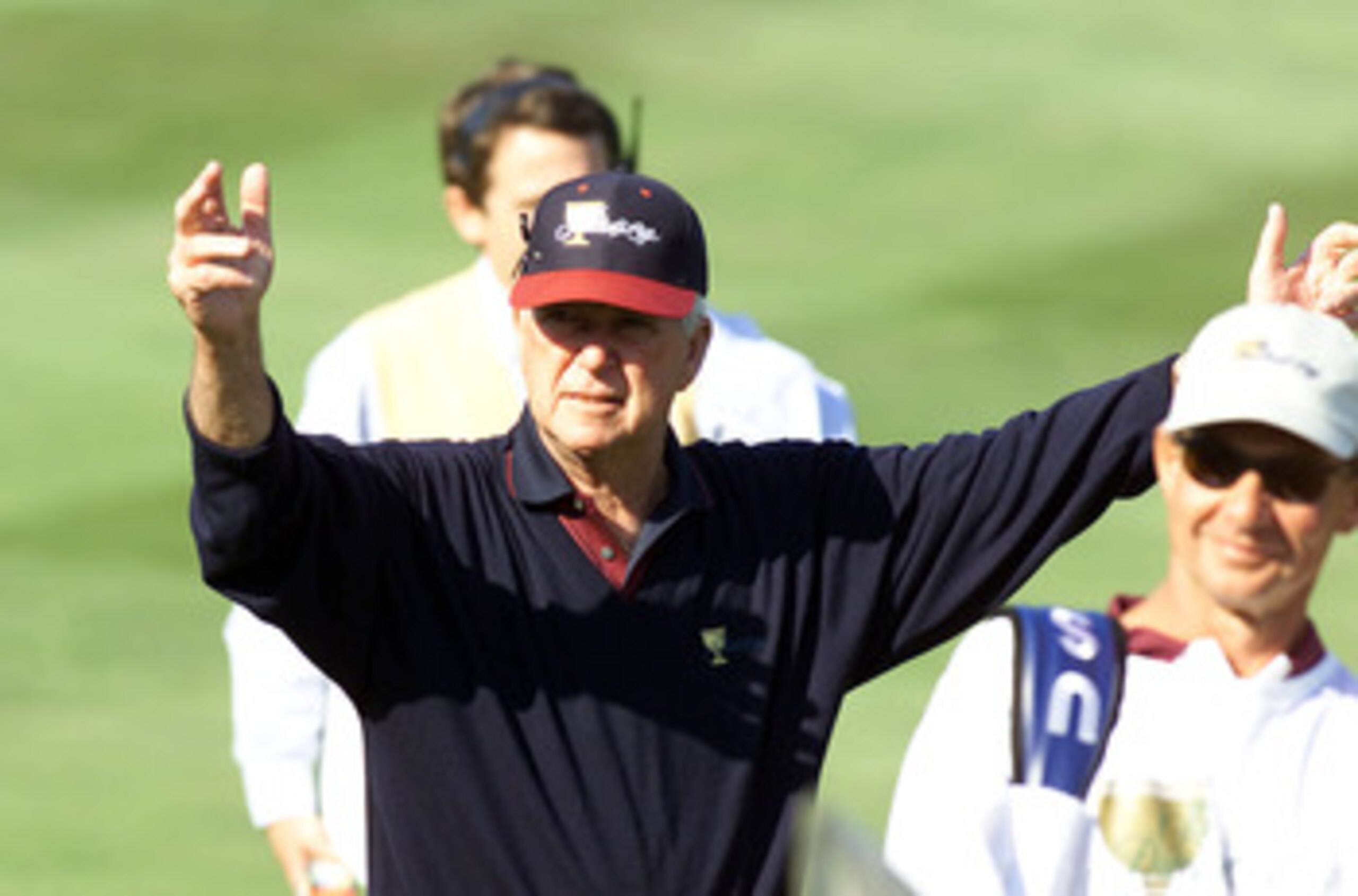 22 Oct 2000:  Captain Ken Venturi of the USA reacts to Davis Love III's approach shot on the 15th hole to win 4 up 3 over Ernie Els to seal the USA's win in the Presidents Cup at the Robert Trent Jones Golf Club in Gainesville, Virginia.