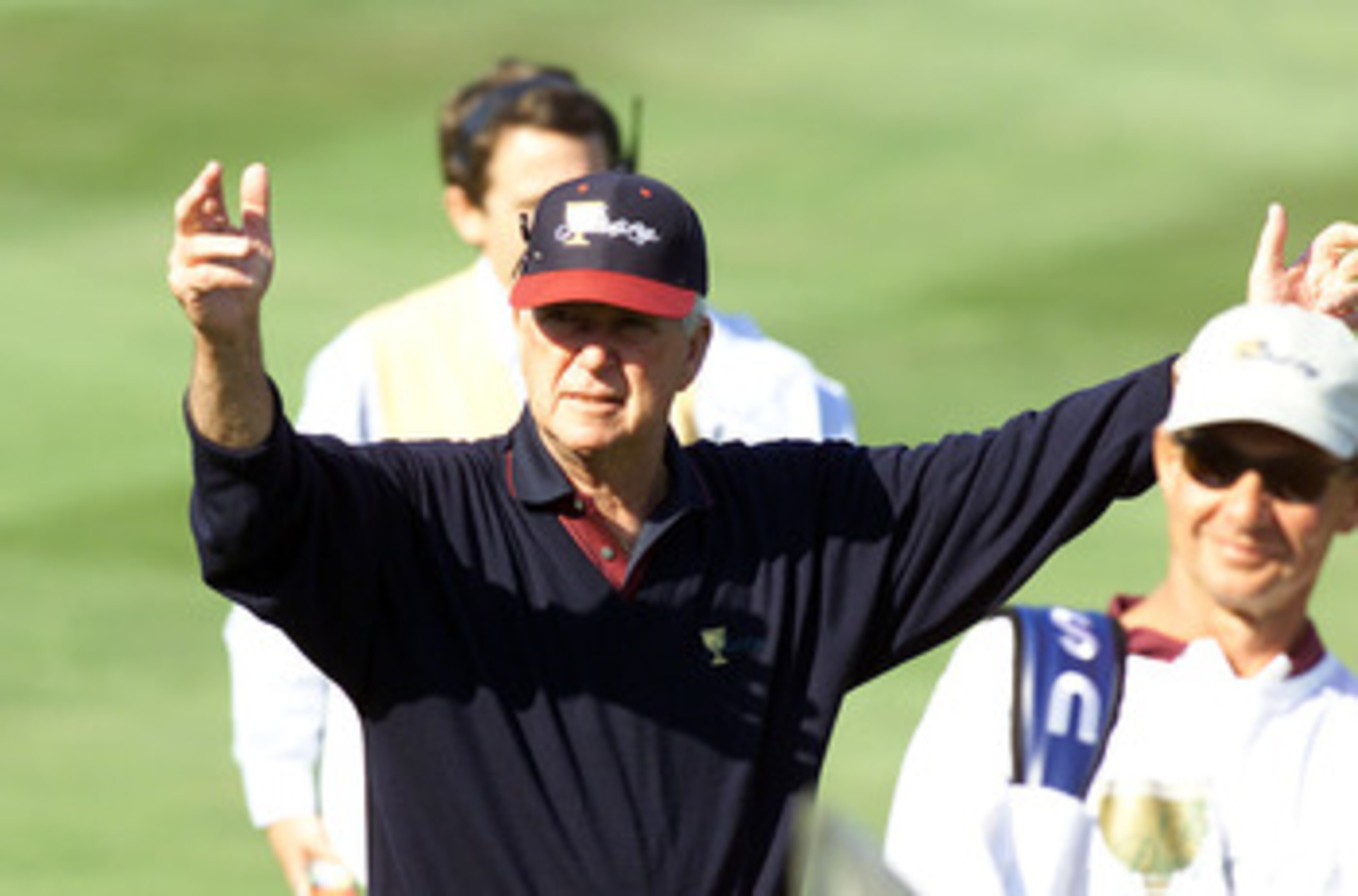 22 Oct 2000:  Captain Ken Venturi of the USA reacts to Davis Love III's approach shot on the 15th hole to win 4 up 3 over Ernie Els to seal the USA's win in the Presidents Cup at the Robert Trent Jones Golf Club in Gainesville, Virginia.