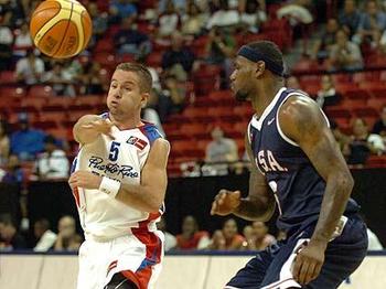 DALLAS - NOVEMBER 27: Jose Barea #11 of the Dallas Mavericks shoots over Lebron James #6 of the Miami Heat on November 27, 2010 at the American Airlines Center in Dallas, Texas. NOTE TO USER: User expressly acknowledges and agrees that, by downloading and