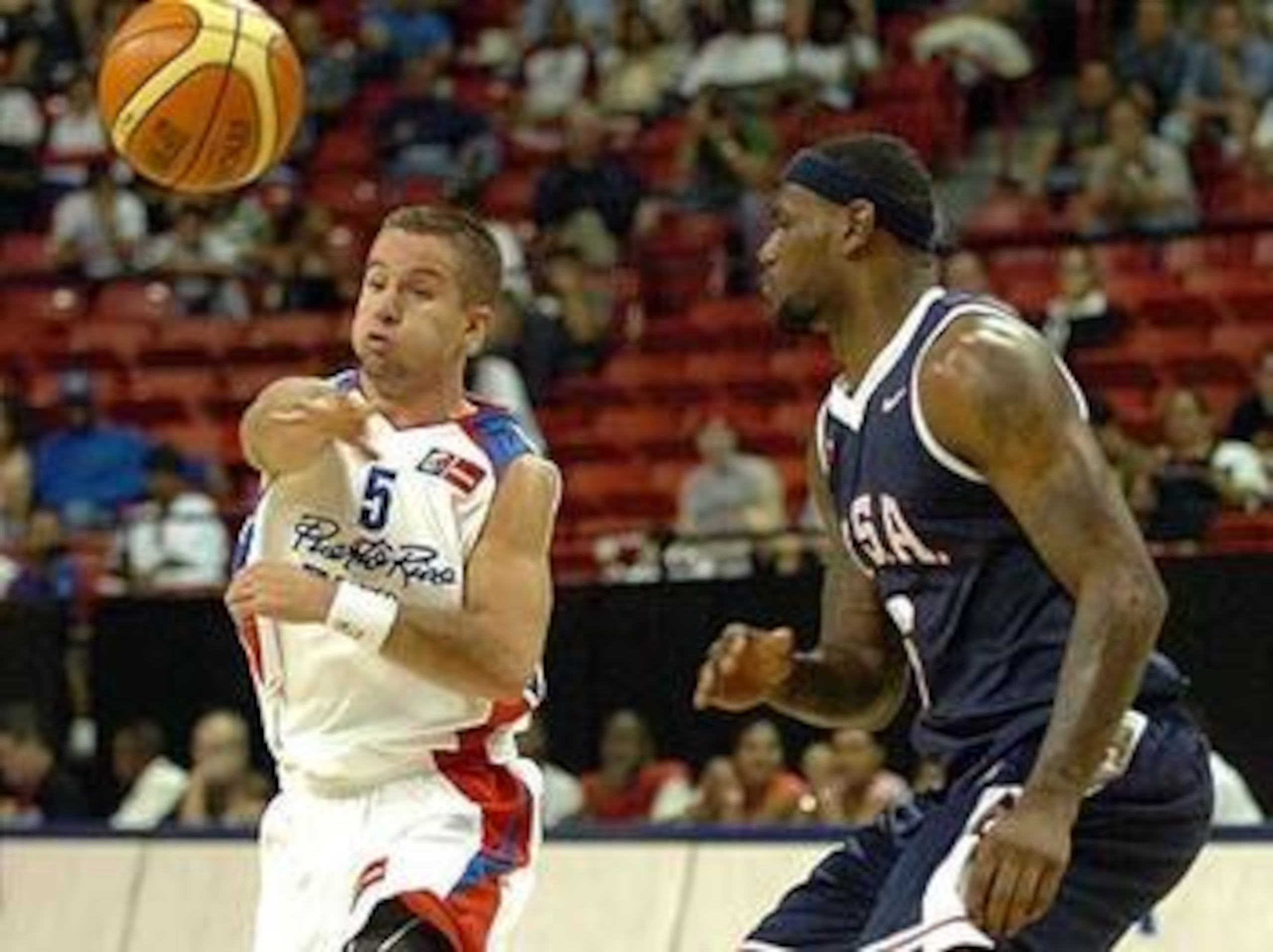 DALLAS - NOVEMBER 27: Jose Barea #11 of the Dallas Mavericks shoots over Lebron James #6 of the Miami Heat on November 27, 2010 at the American Airlines Center in Dallas, Texas. NOTE TO USER: User expressly acknowledges and agrees that, by downloading and