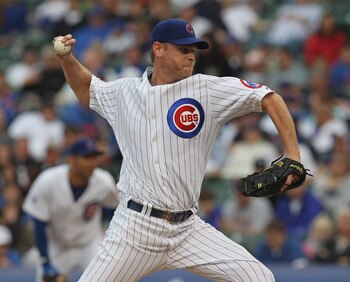 CHICAGO, IL - MAY 29: Kerry Wood #34 of the Chicago Cubs delivers the ball against the Pittsburgh Pirates at Wrigley Field on May 29, 2011 in Chicago, Illinois. The Cubs defeated the Pirates 3-2.  (Photo by Jonathan Daniel/Getty Images)