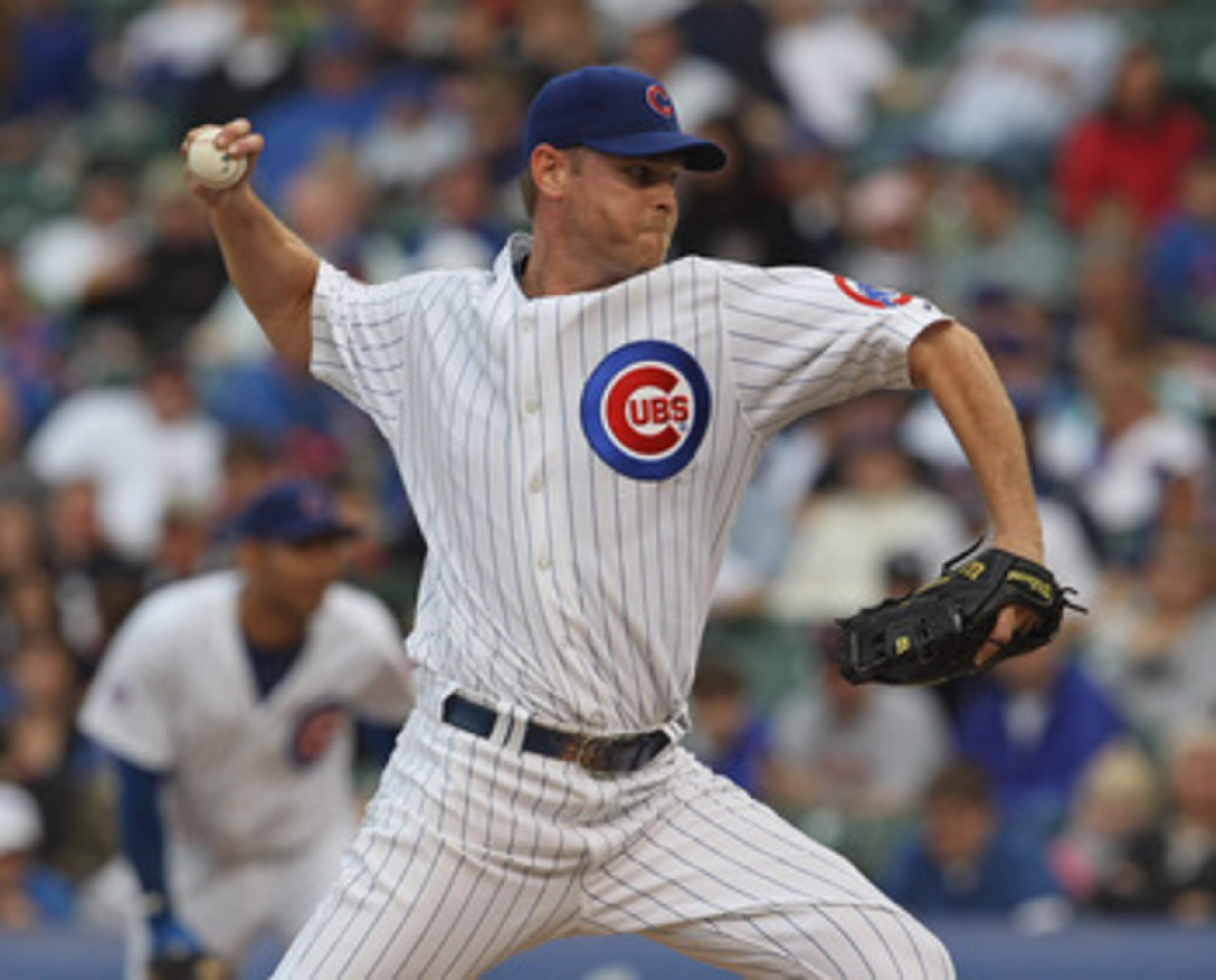 CHICAGO, IL - MAY 29: Kerry Wood #34 of the Chicago Cubs delivers the ball against the Pittsburgh Pirates at Wrigley Field on May 29, 2011 in Chicago, Illinois. The Cubs defeated the Pirates 3-2.  (Photo by Jonathan Daniel/Getty Images)