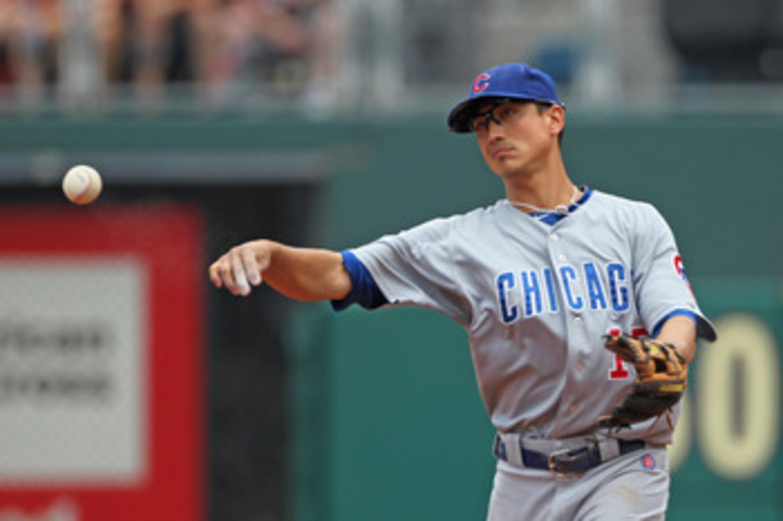 PHILADELPHIA - JUNE 12: Second baseman Darwin Barney #15 of the Chicago Cubs throws to first base during a game against the Philadelphia Phillies at Citizens Bank Park on June 12, 2011 in Philadelphia, Pennsylvania. (Photo by Hunter Martin/Getty Images)