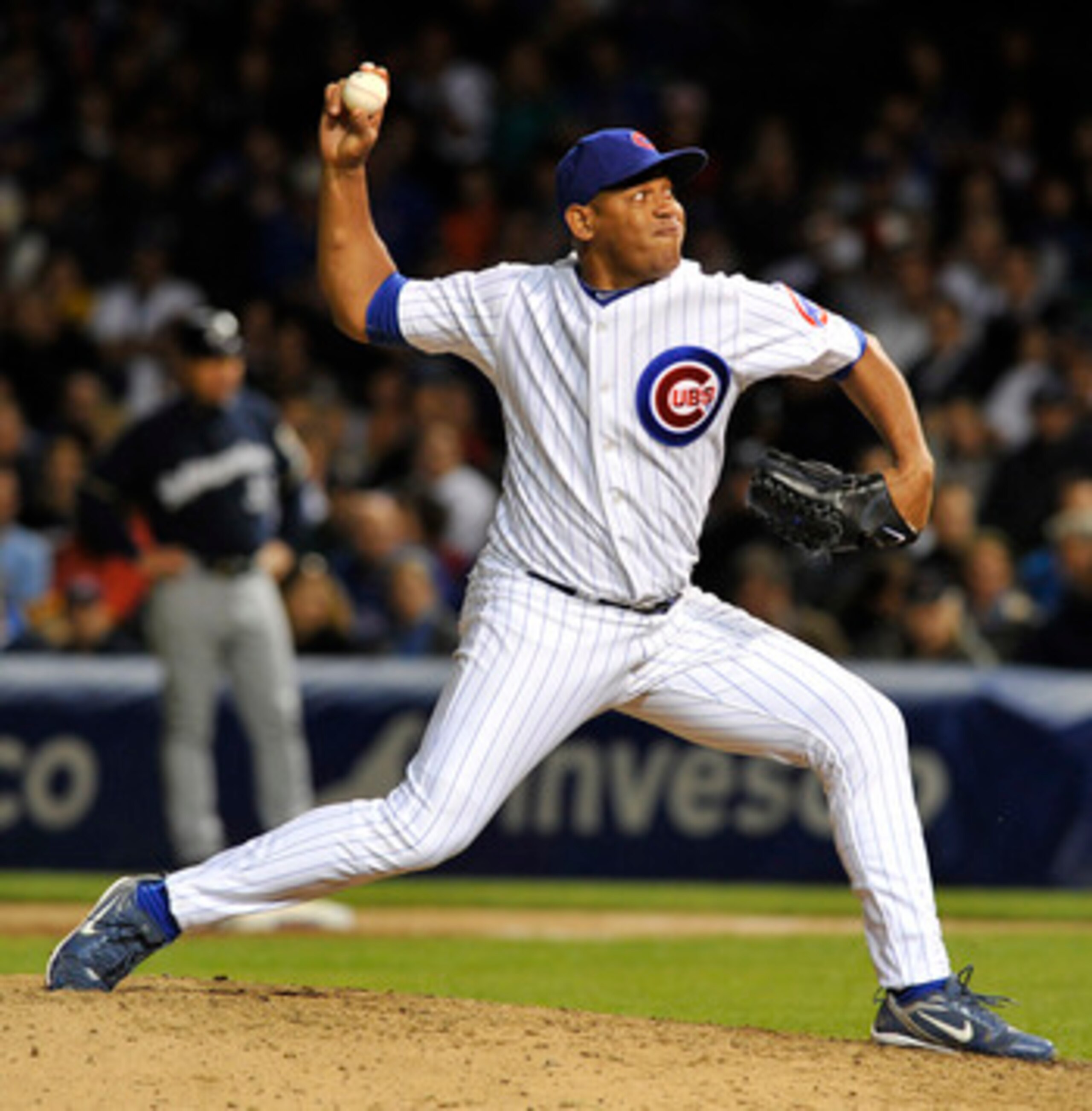 CHICAGO, IL - JUNE 13: Carlos Marmol # 49 of the Chicago Cubs pitches against the Milwaukee Brewers on June 13, 2011 at Wrigley Field in Chicago, Illinois. The Cubs defeated the Brewers 1-0.  (Photo by David Banks/Getty Images)