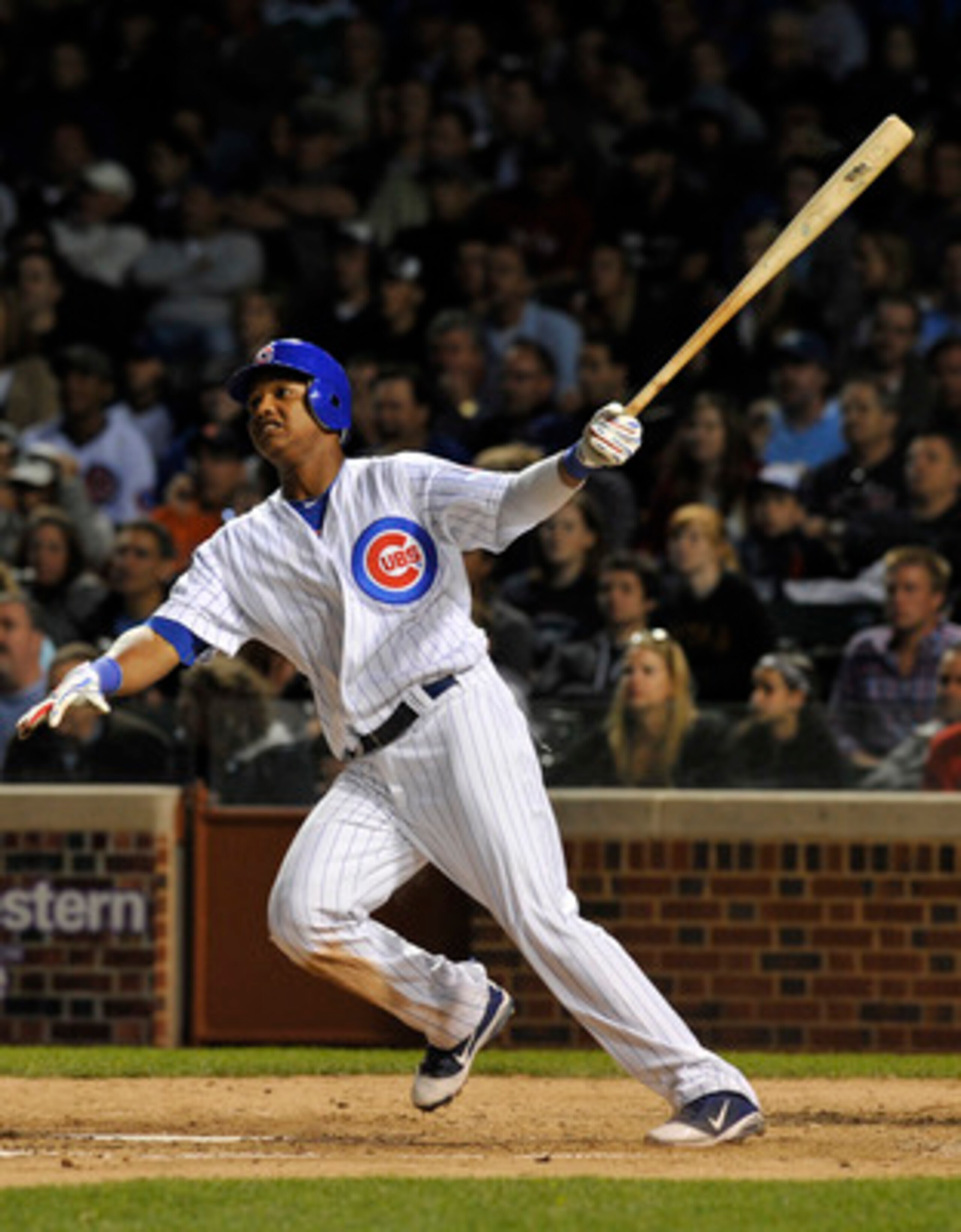 CHICAGO, IL - JUNE 13: Starlin Castro #13 of the Chicago Cubs bats against the Milwaukee Brewers on June 13, 2011 at Wrigley Field in Chicago, Illinois. The Cubs defeated the Brewers 1-0.  (Photo by David Banks/Getty Images)